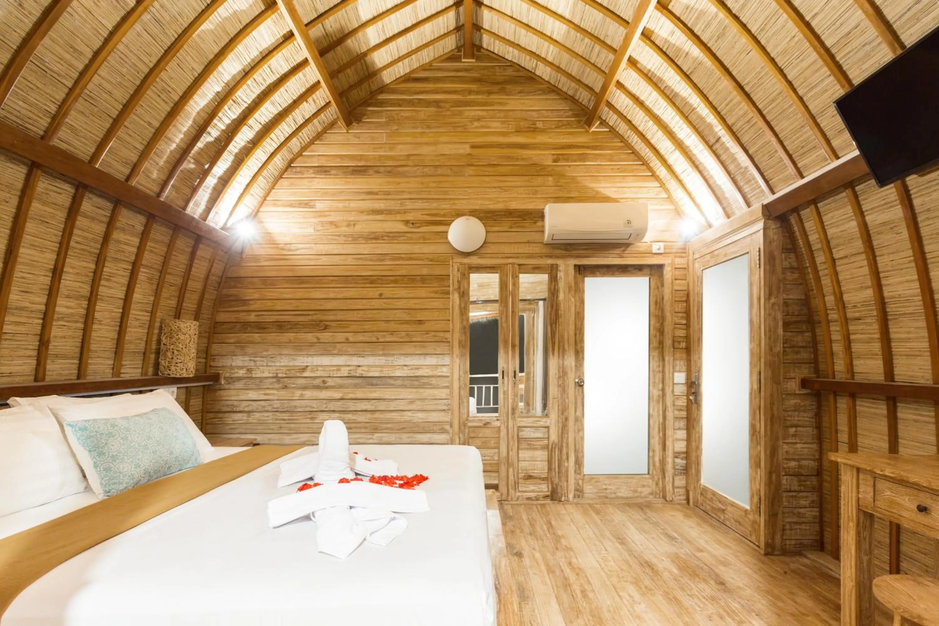 Bed in The Dewi Premier Nusa Penida