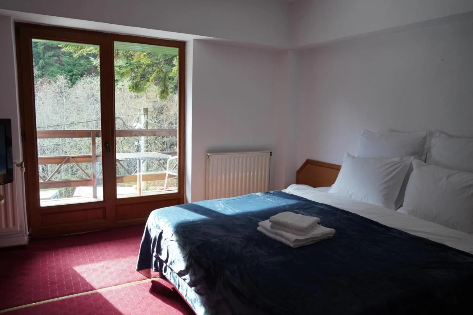 Bed in Pensiunea Kalinder