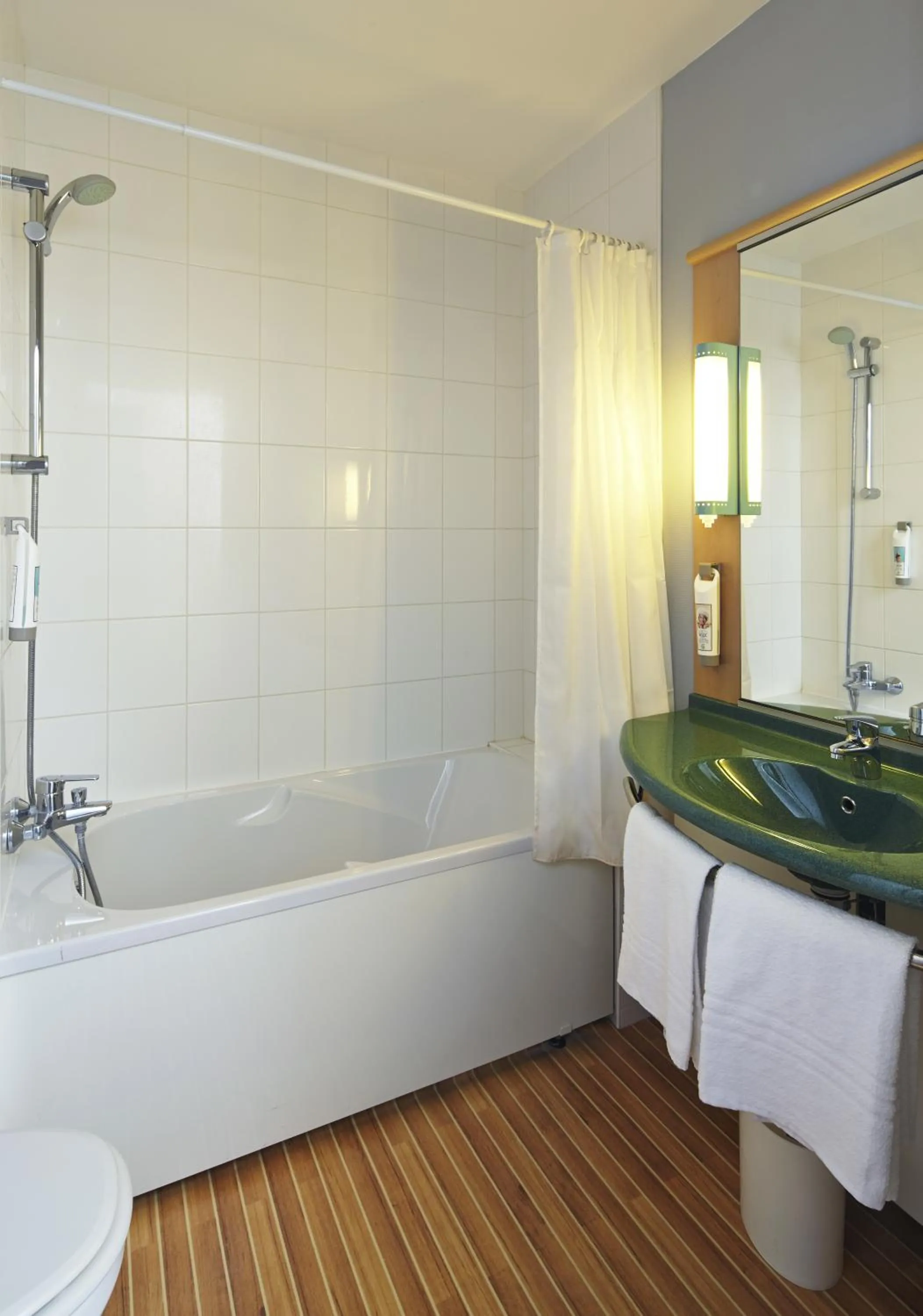 Toilet in ibis Chartres Ouest Luce