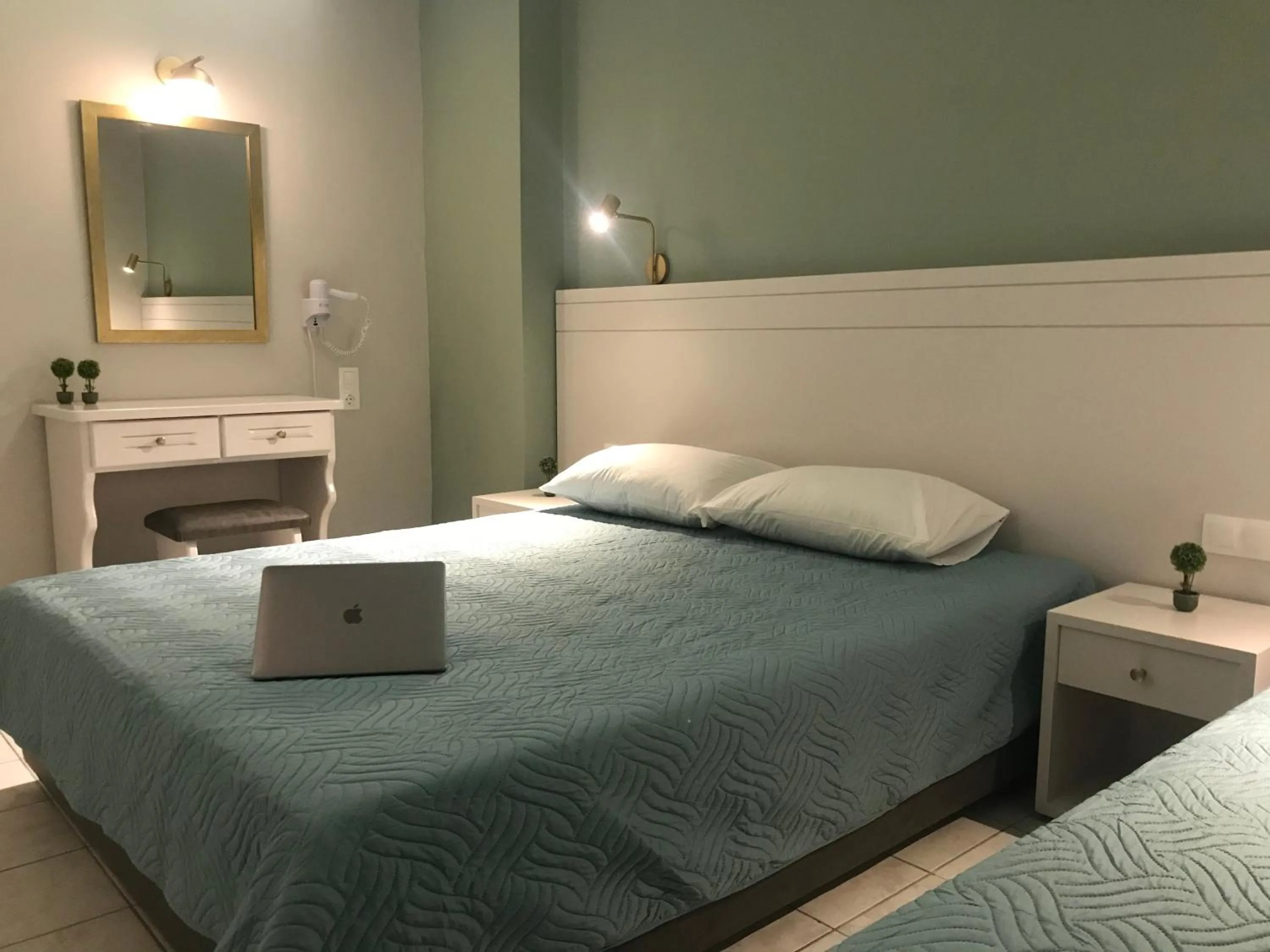 Bed in George Deluxe Apartments