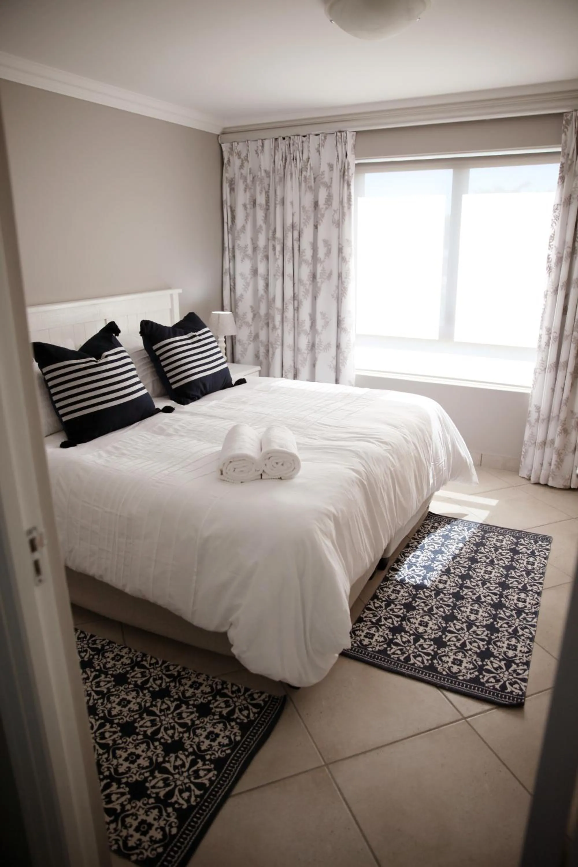 Bed in Mari-Amor Self-Catering Apartments