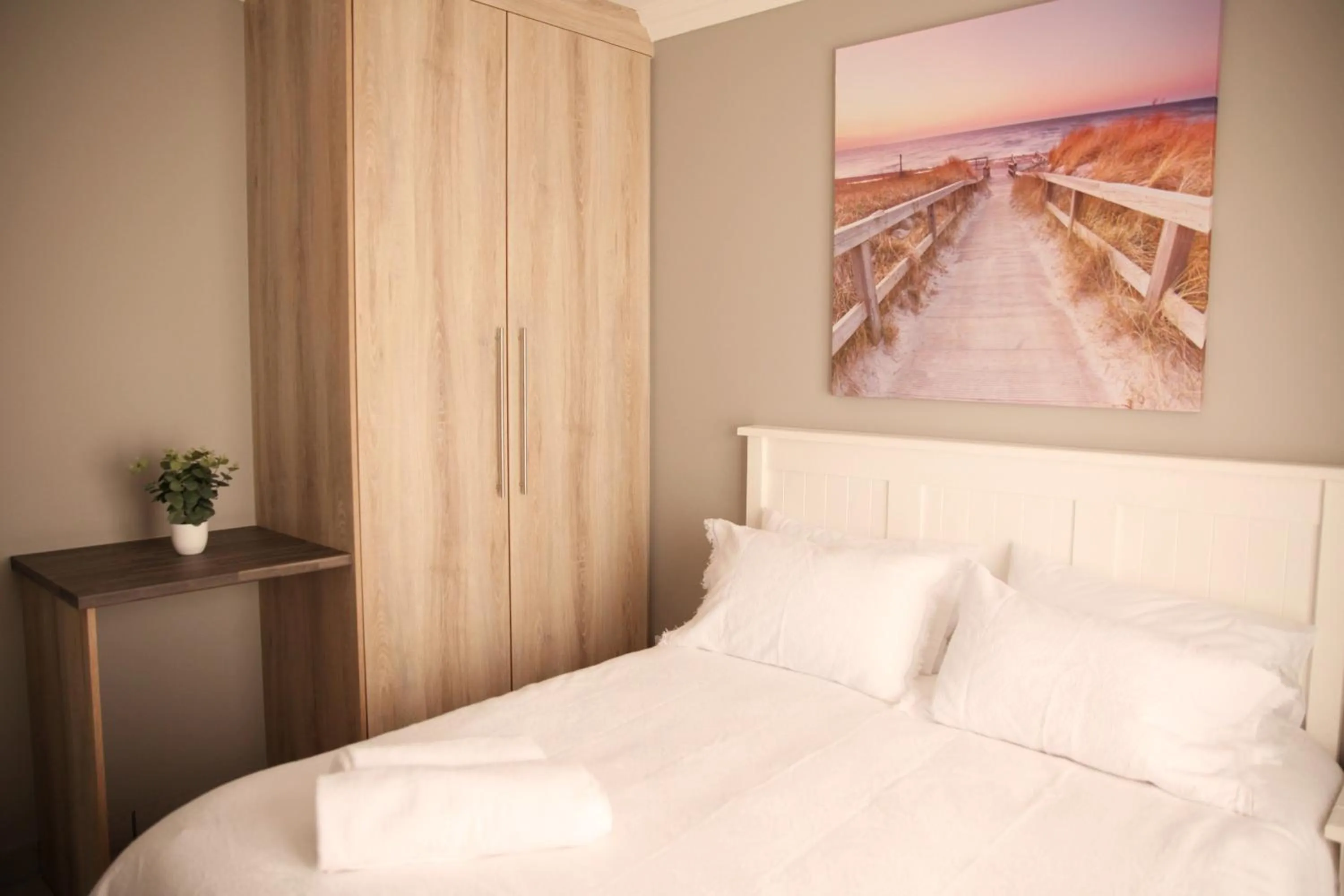 Bed in Mari-Amor Self-Catering Apartments