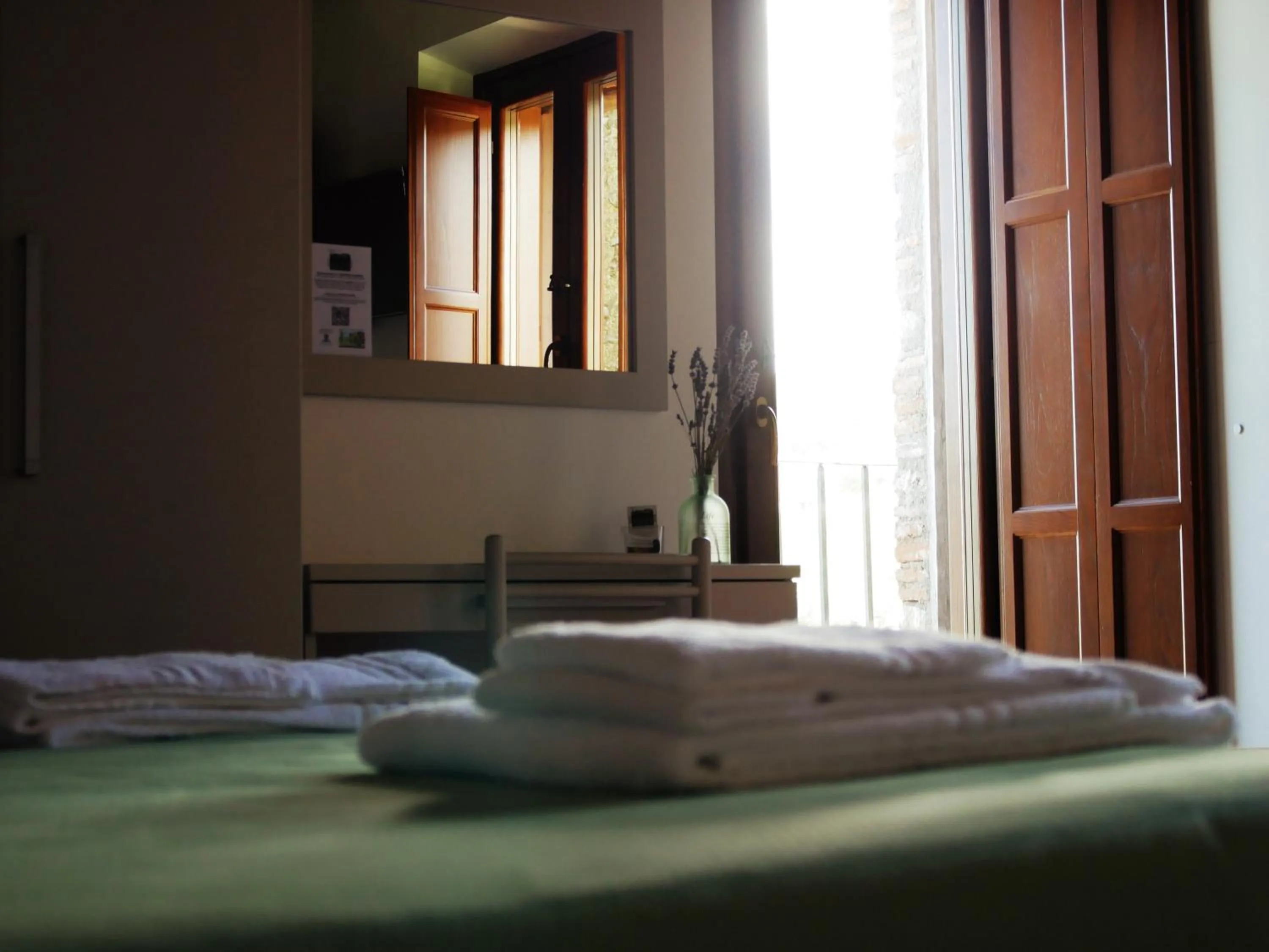 towels, Bed in B&B Leofreni Natura