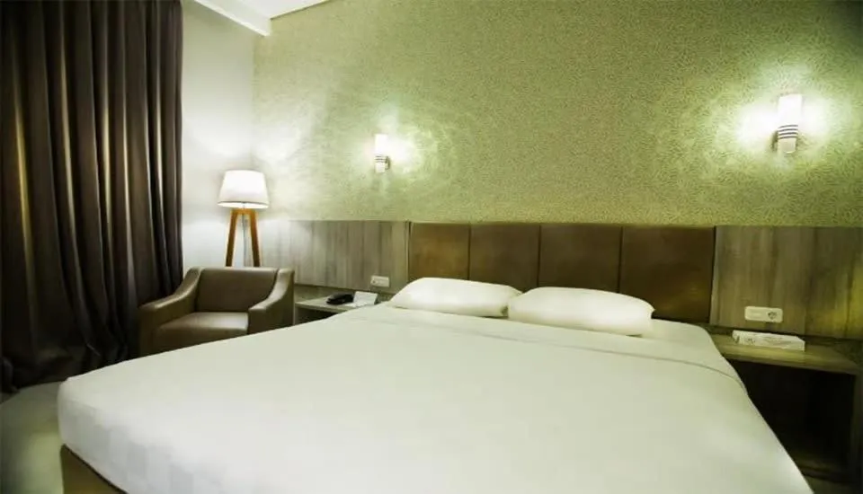 Bed in Raden Wijaya Hotel & Convention