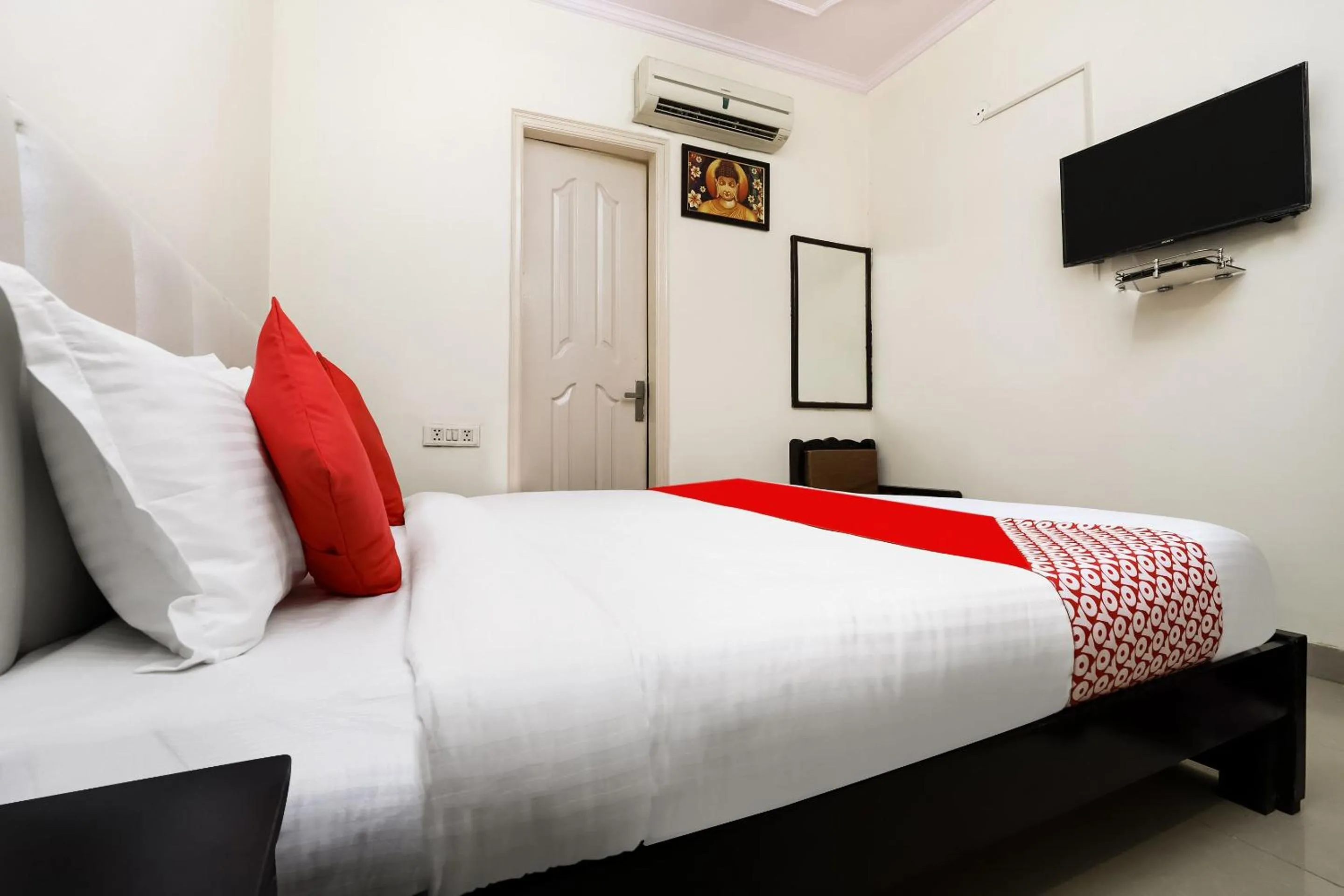 Bedroom in Collection O Ramji Grand Near Tdi Mall