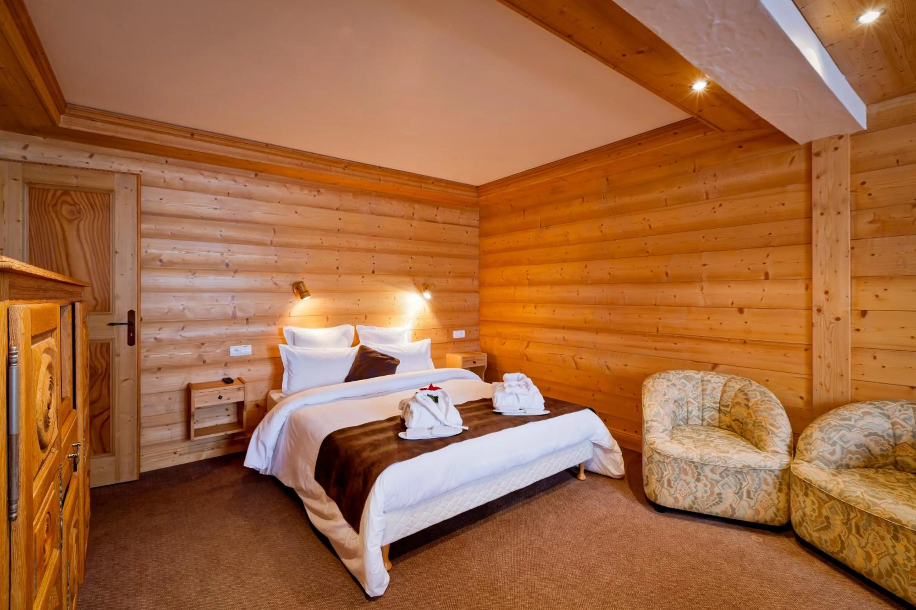 Bed in Hotel les Flocons