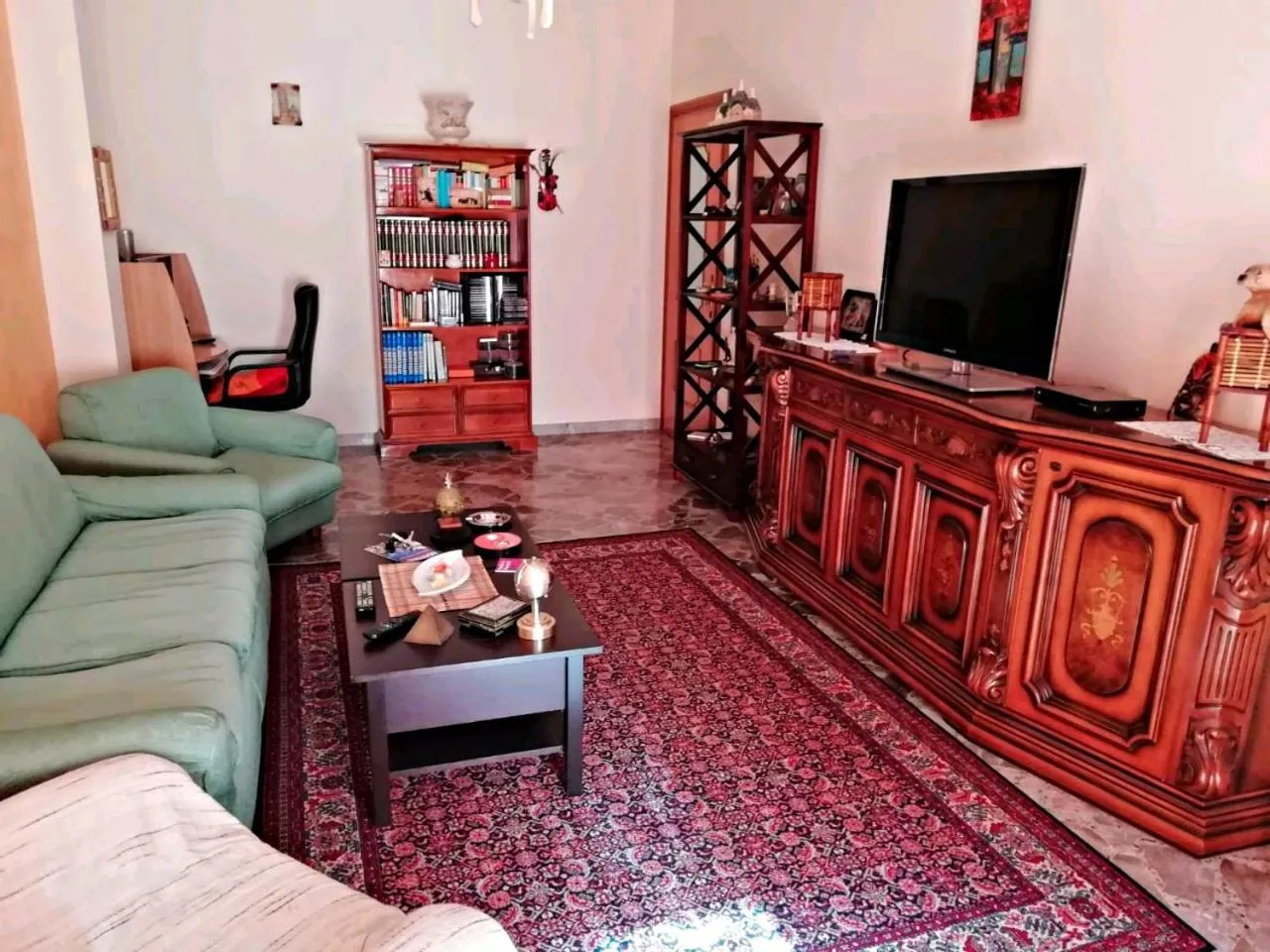 Communal lounge/ TV room, Seating Area in A Casa di Raffy