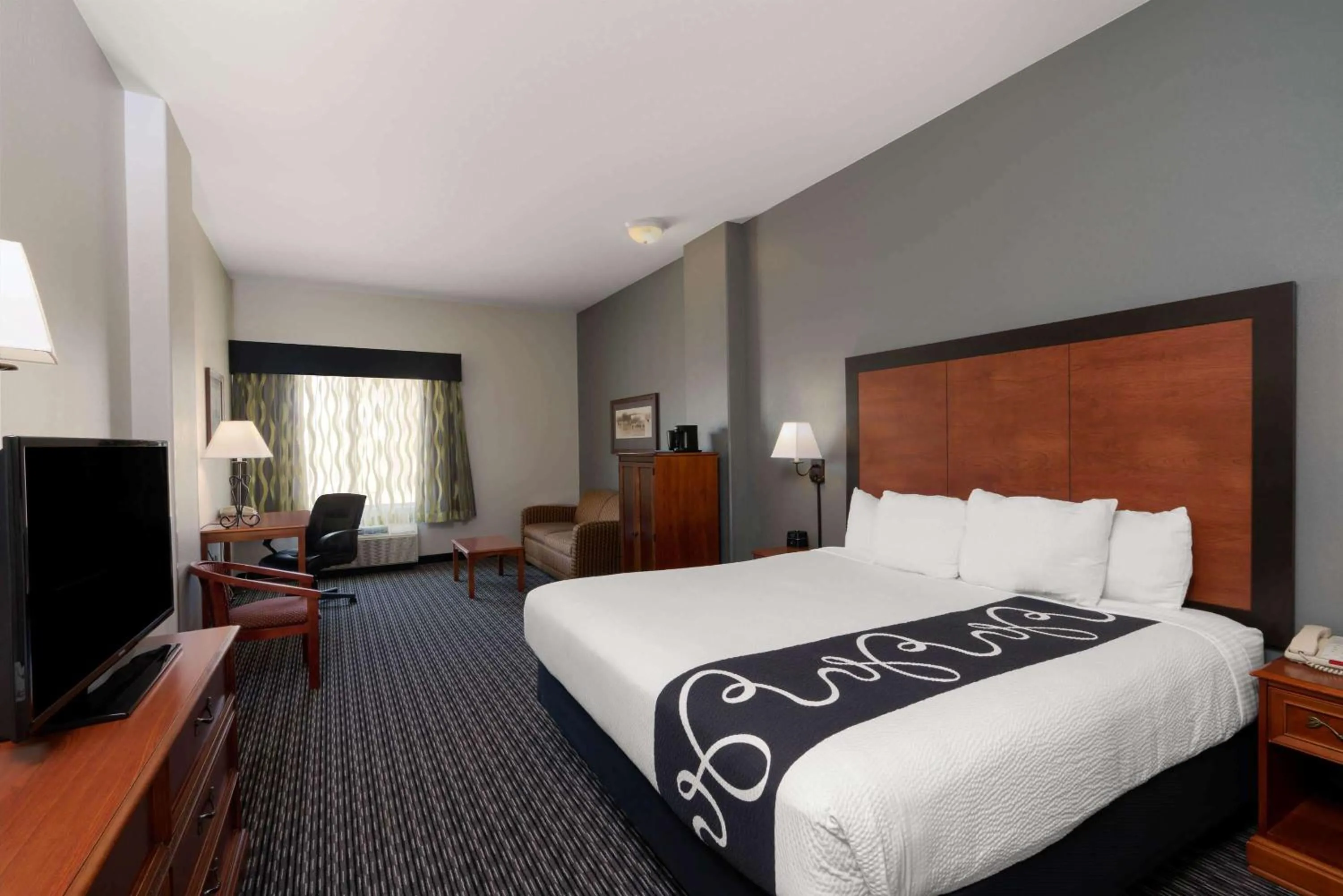 Bed in La Quinta by Wyndham Rifle