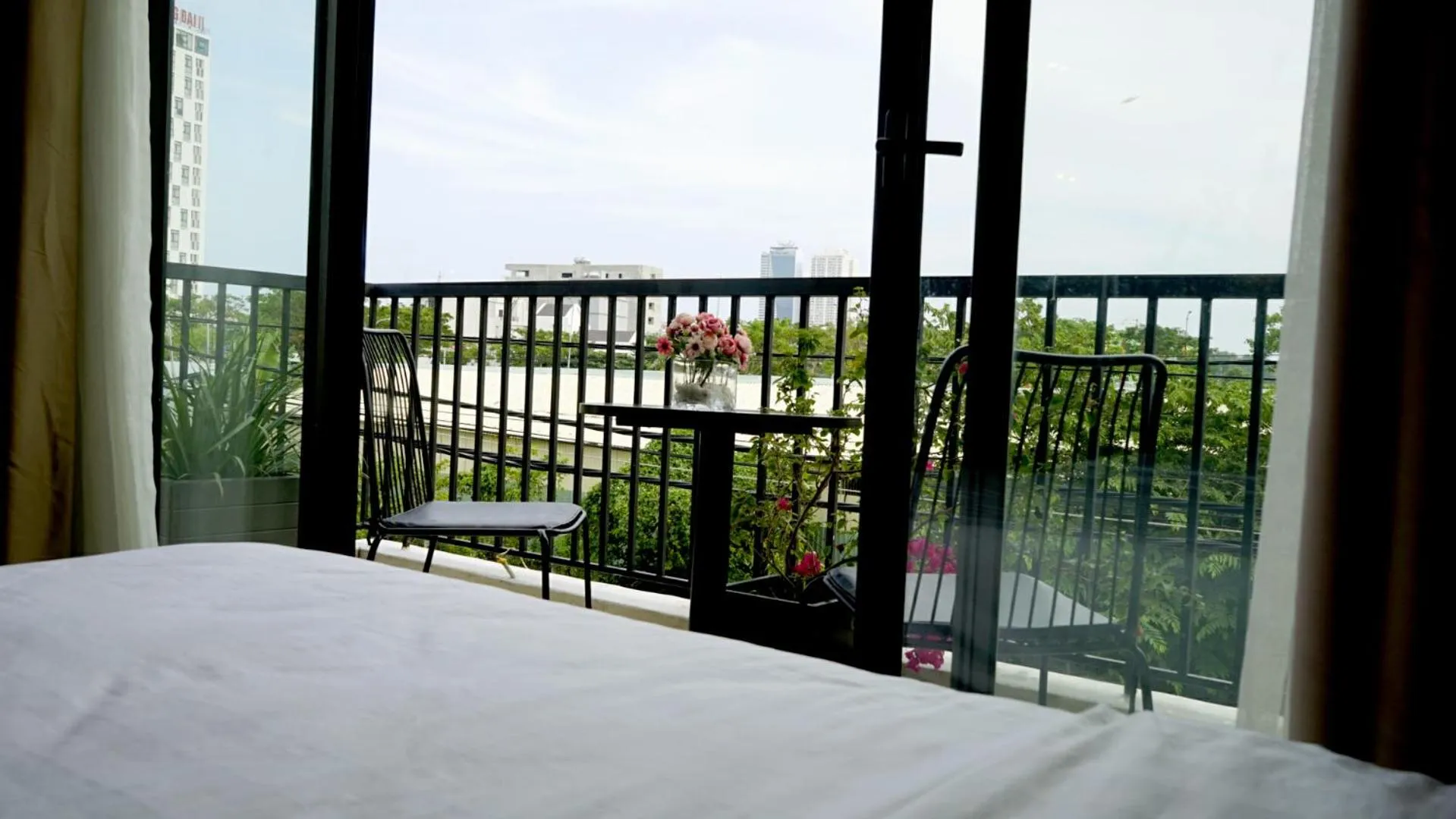 Bed in Oasis Hotel & Apartment