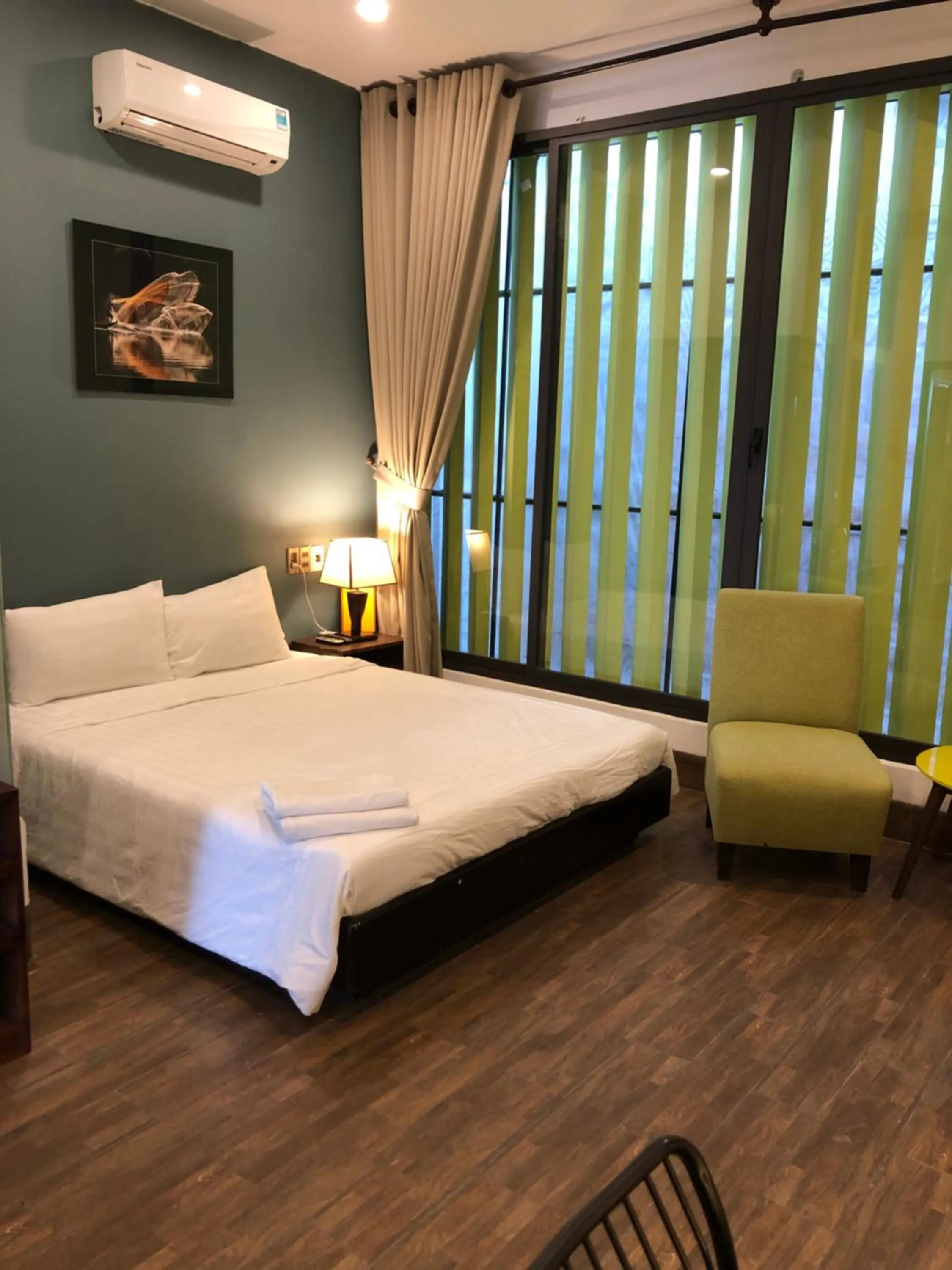 Bed in Oasis Hotel & Apartment