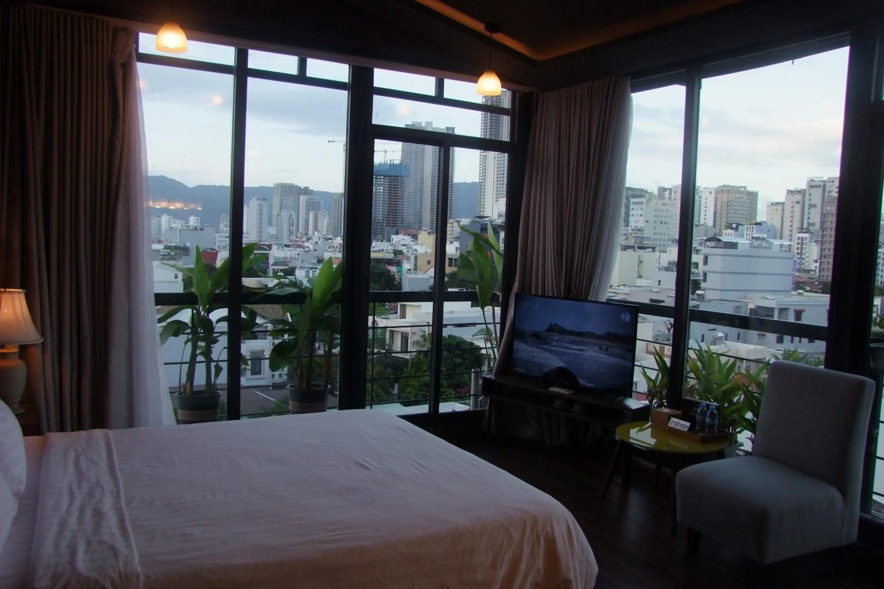 Bed in Oasis Hotel & Apartment