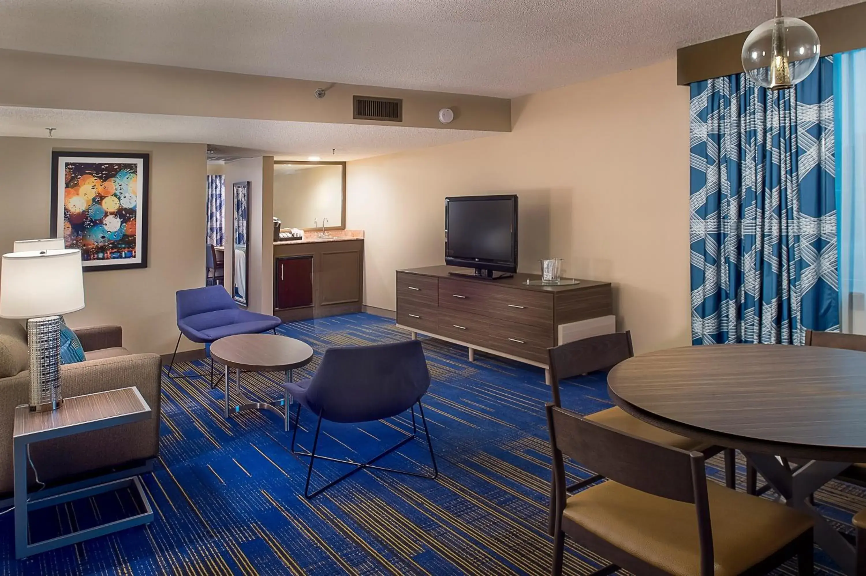 Living room in HoteLumiere at the Arch, A Caesars Destination Living room in HoteLumiere at the Arch, A Caesars Destination