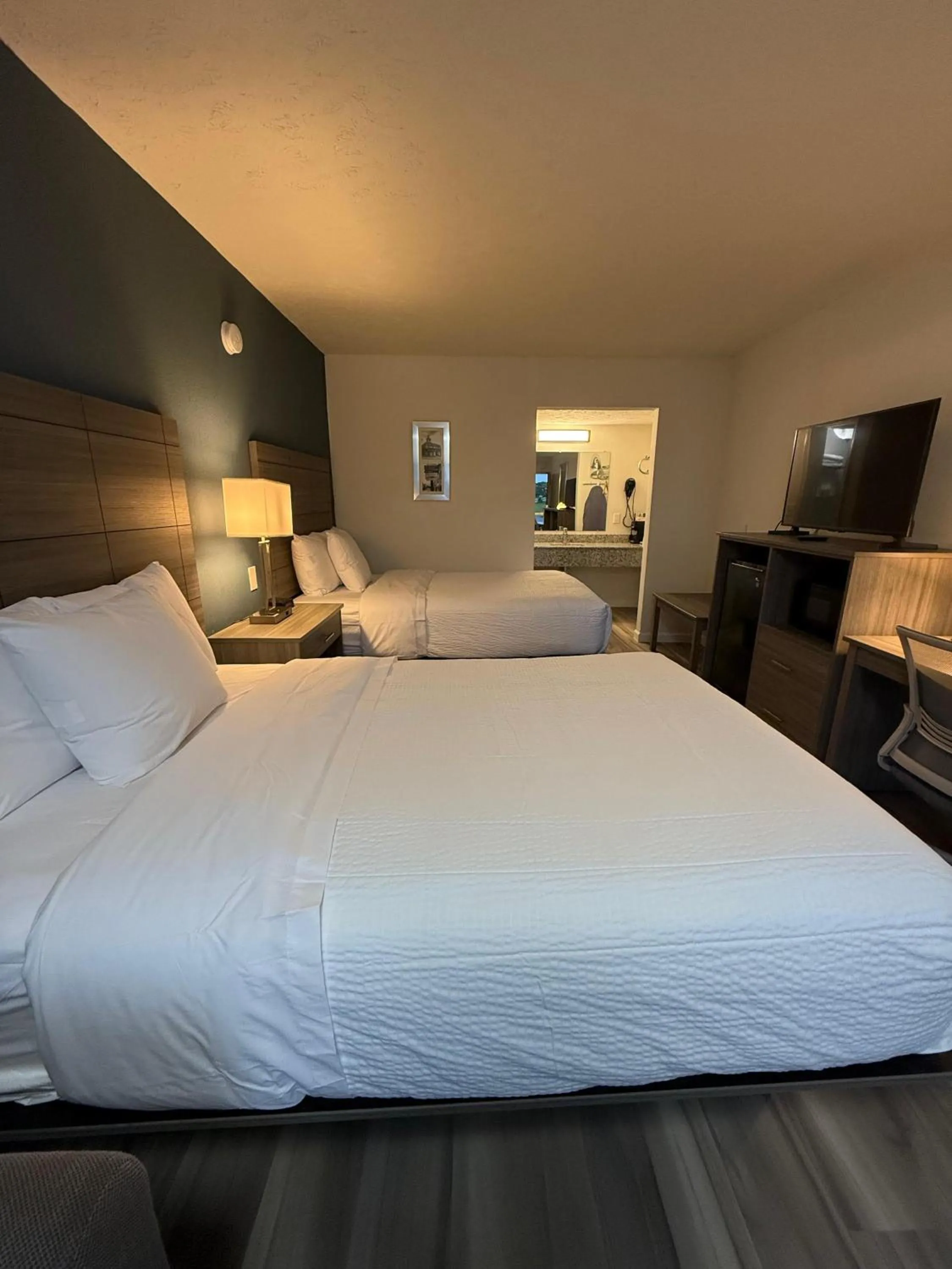Bed in Ramada by Wyndham Lumberton