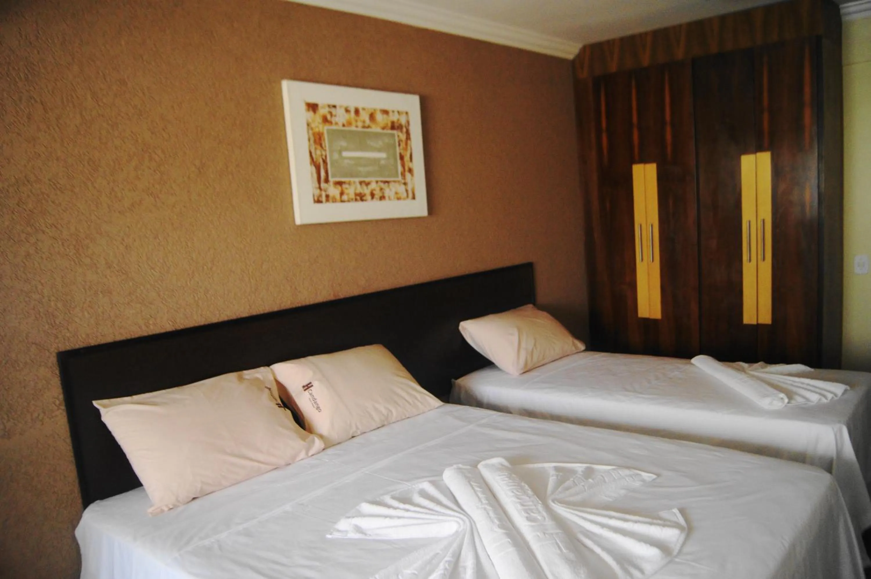 Bed in Candango Aero Hotel