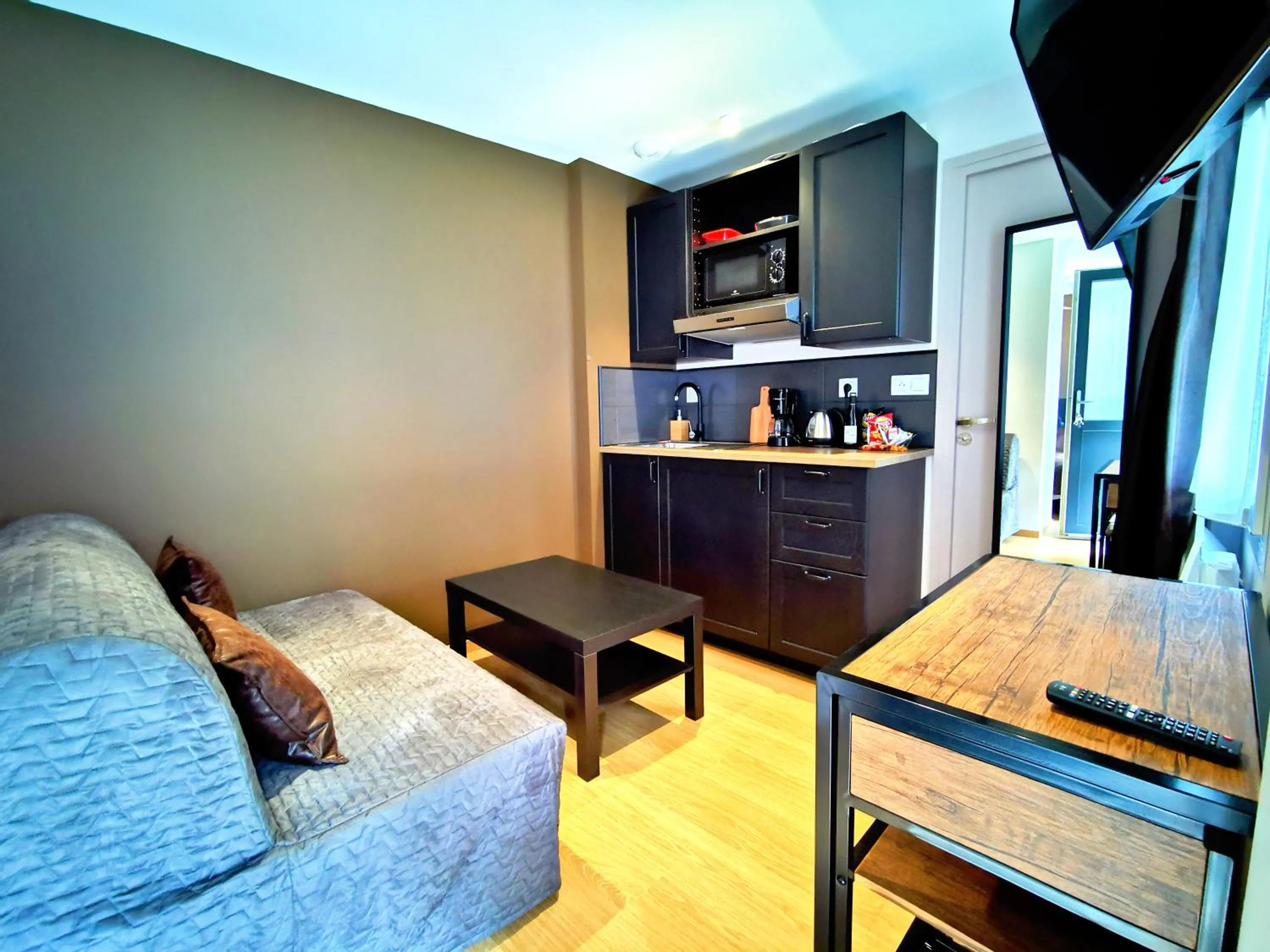 Kitchen or kitchenette in Appart Hotel Relax Spa