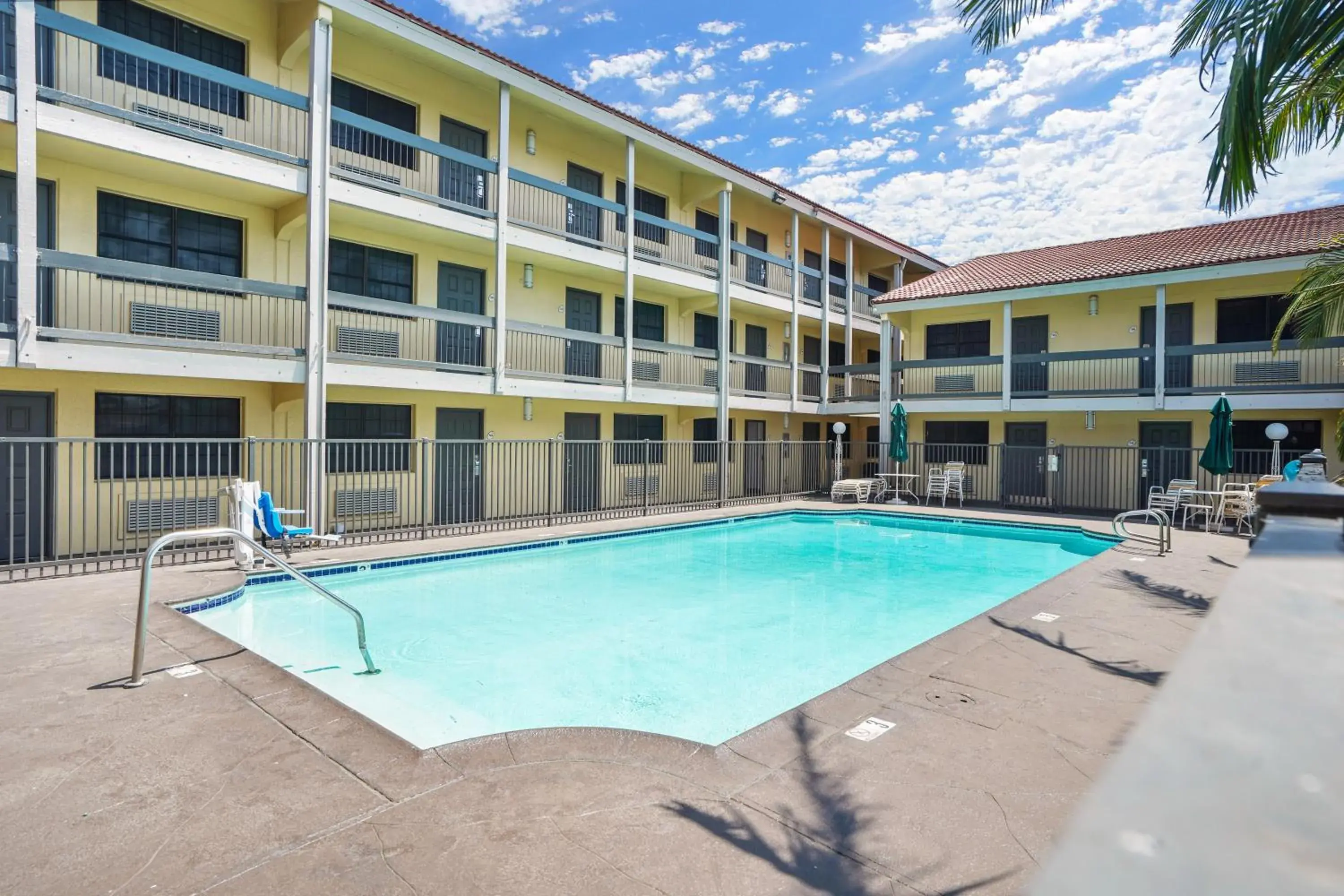 Swimming pool, Property Building in La Quinta Inn by Wyndham Costa Mesa Orange County