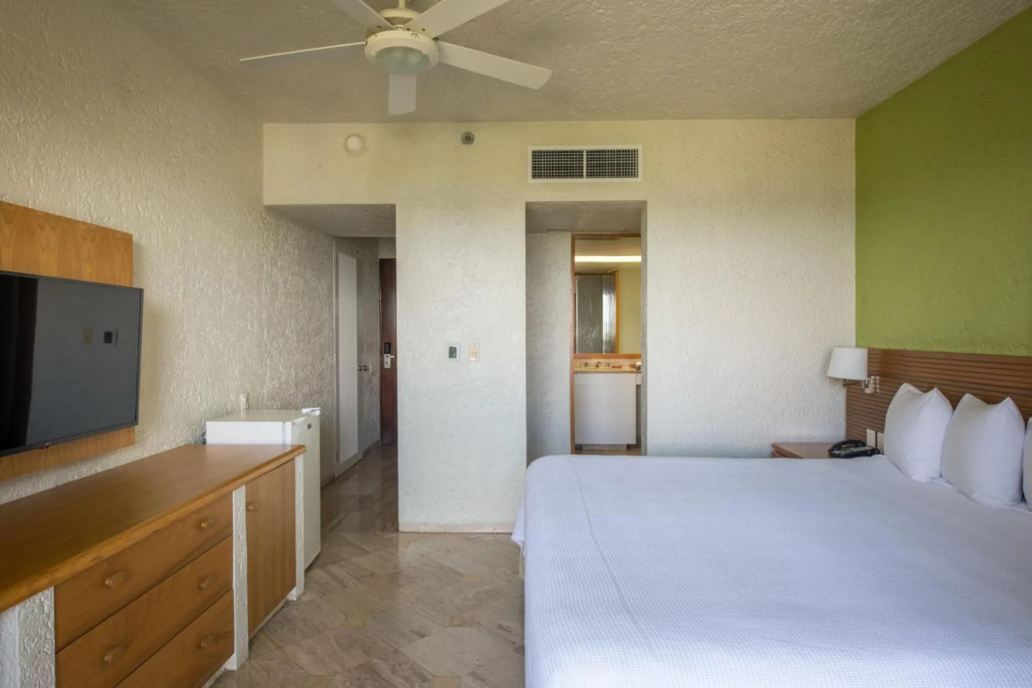 Bed in Club Regina Cancun