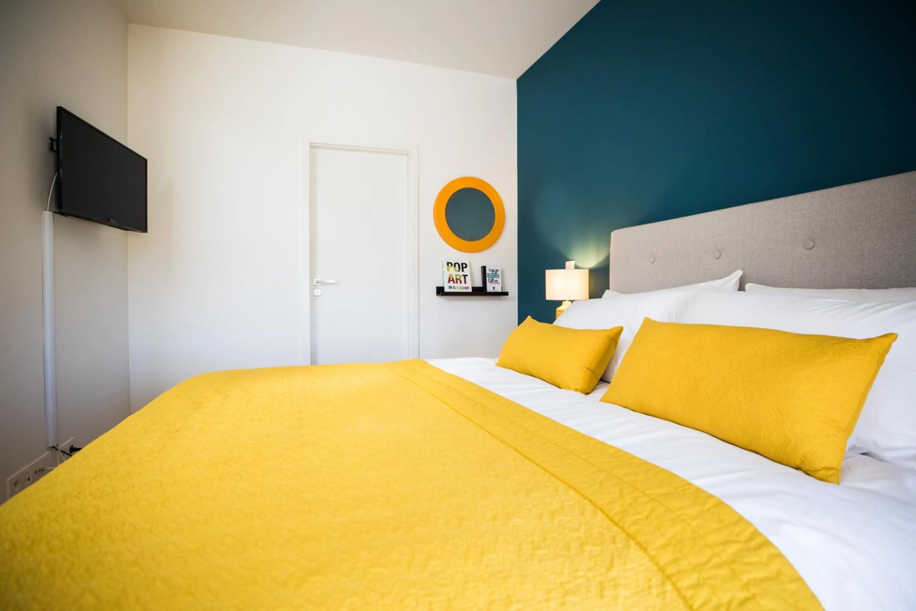 Bed in Chez Spoons B&B