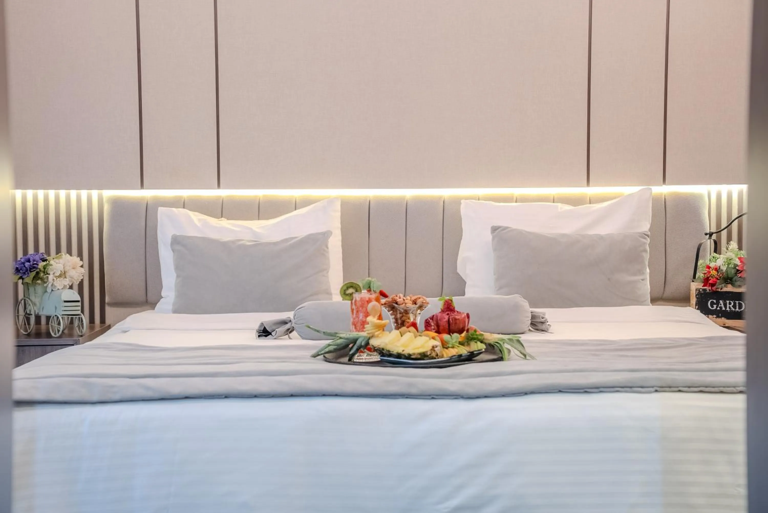 Bed in BEST GARDEN HOTEL