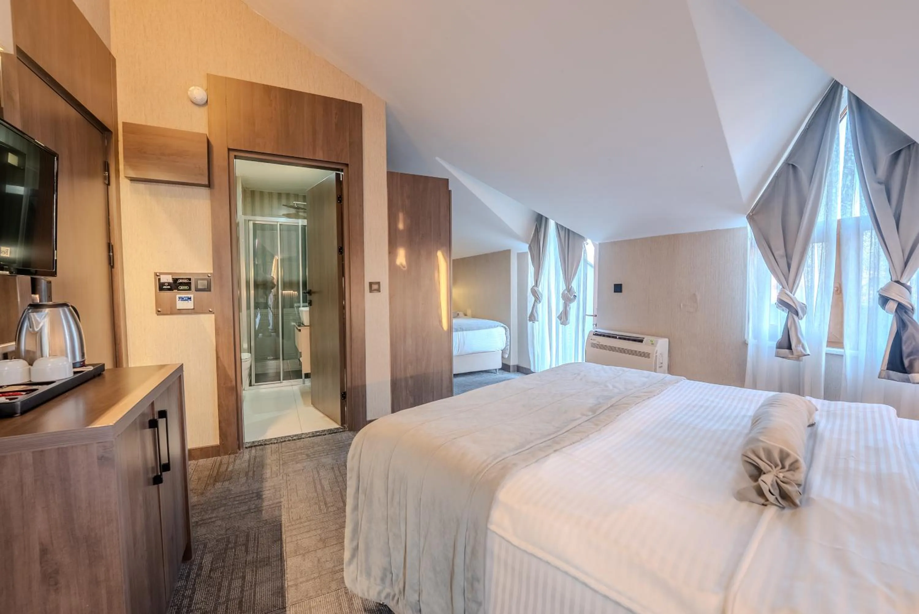 Photo of the whole room, Bed in BEST GARDEN HOTEL