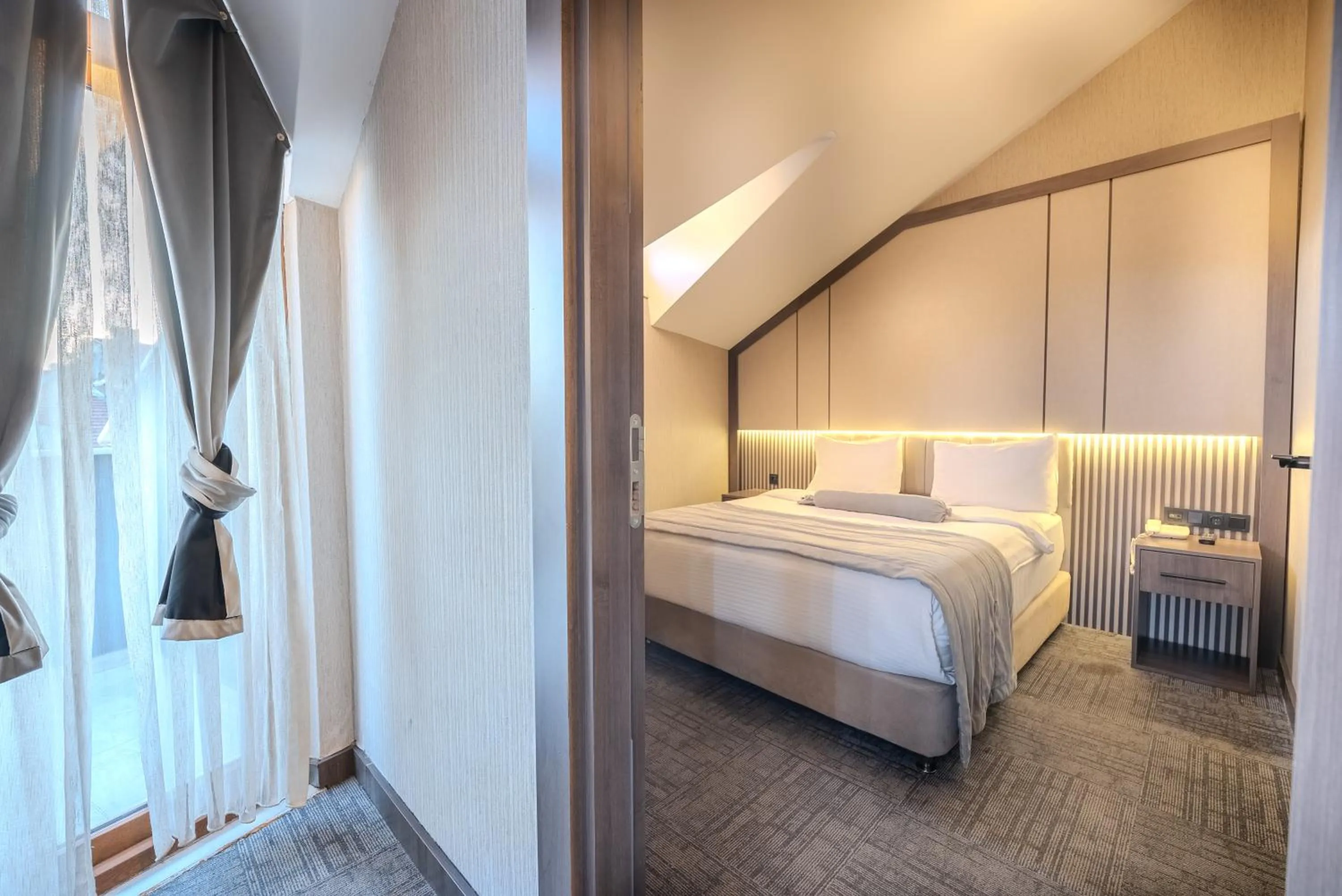 Photo of the whole room, Bed in BEST GARDEN HOTEL