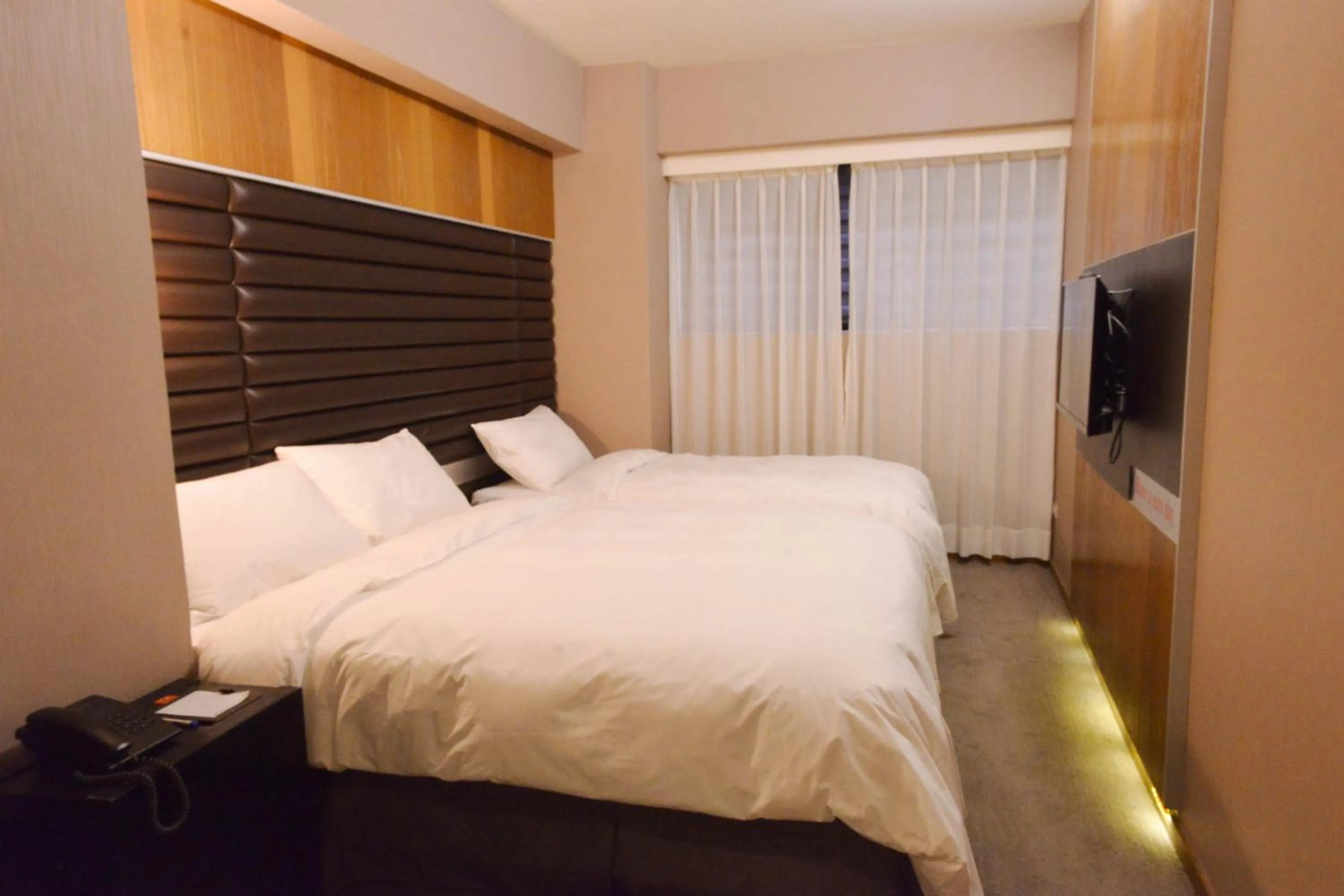 Bed in 新麗旅店 Newful Hotel