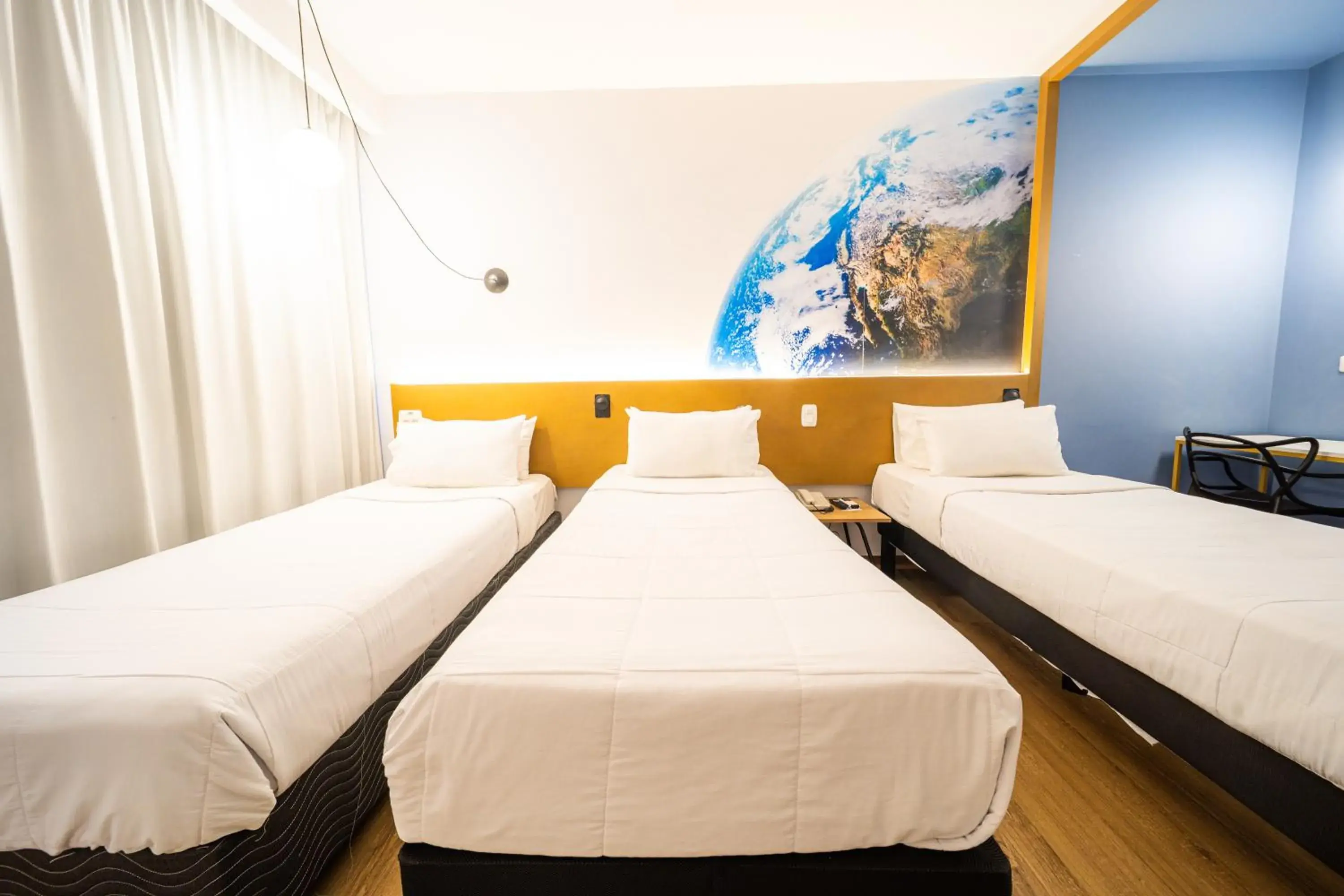 Standard Triple Room with Three Single Beds in Hotel Euro Suite Curitiba Batel By Nacional Inn Standard Triple Room with Three Single Beds in Hotel Euro Suite Curitiba Batel By Nacional Inn