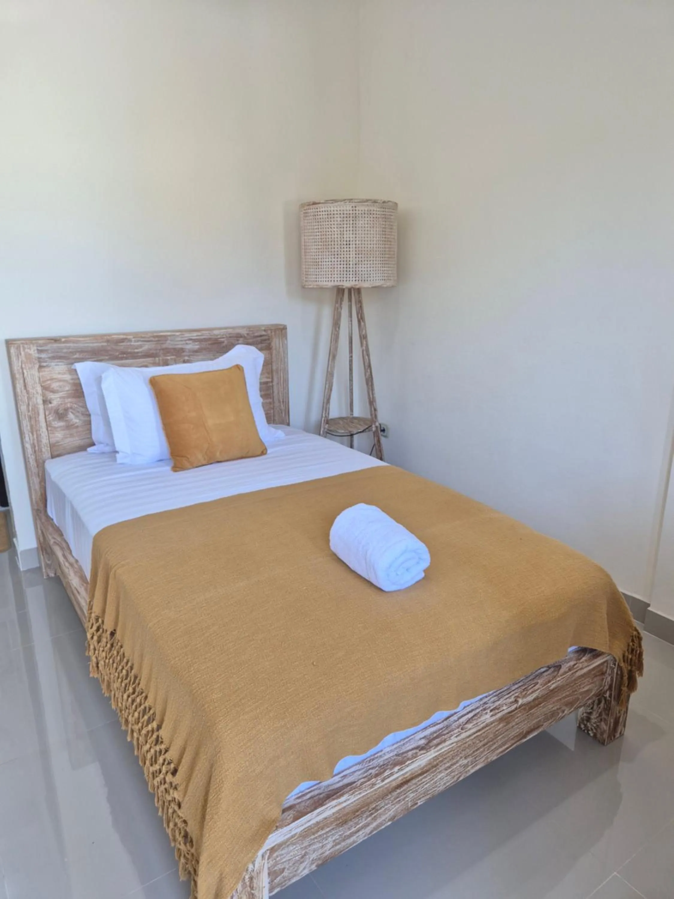 Bed in Laksmi Guest House