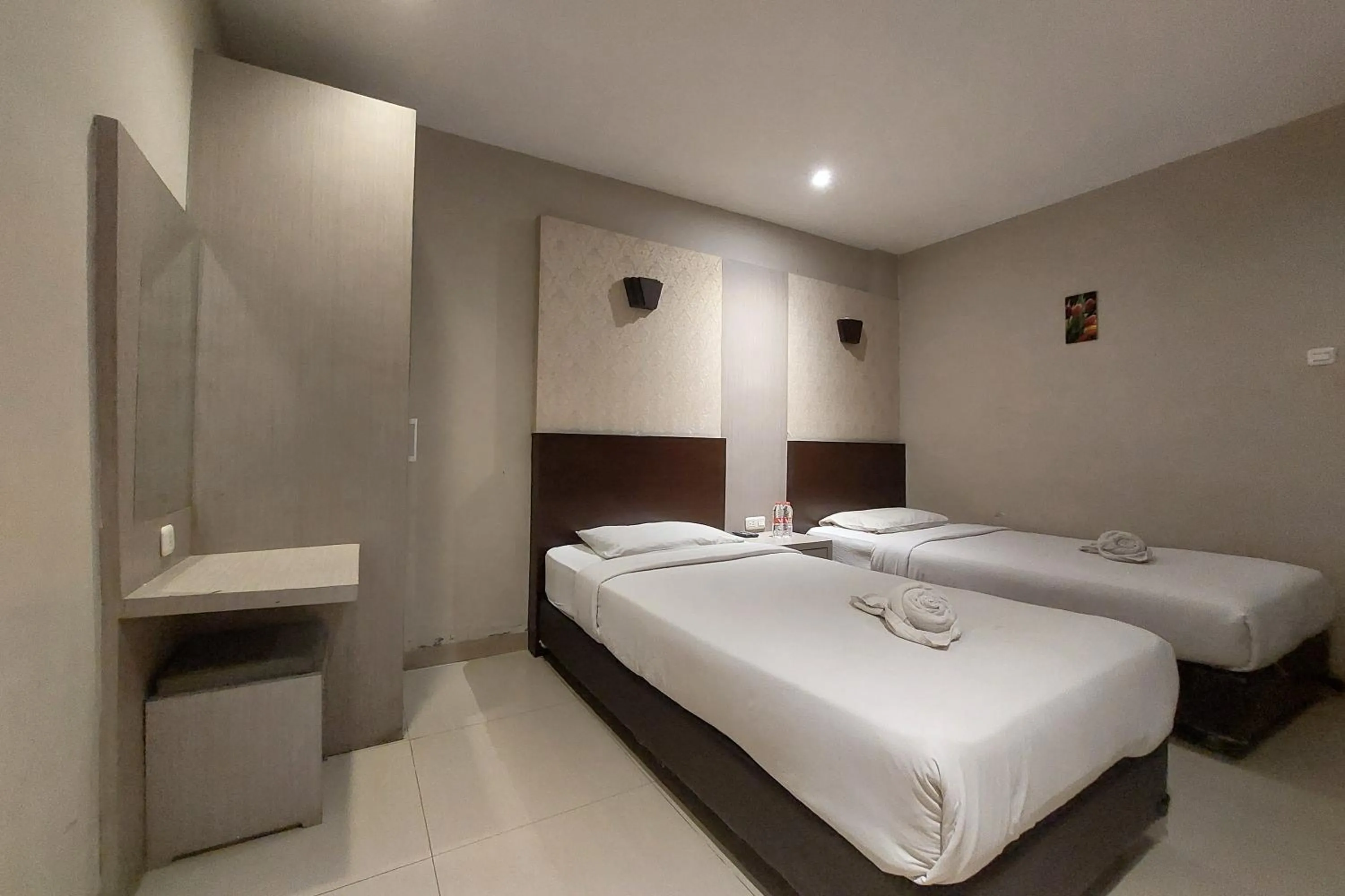 Bed in Hotel Bumi Malaya