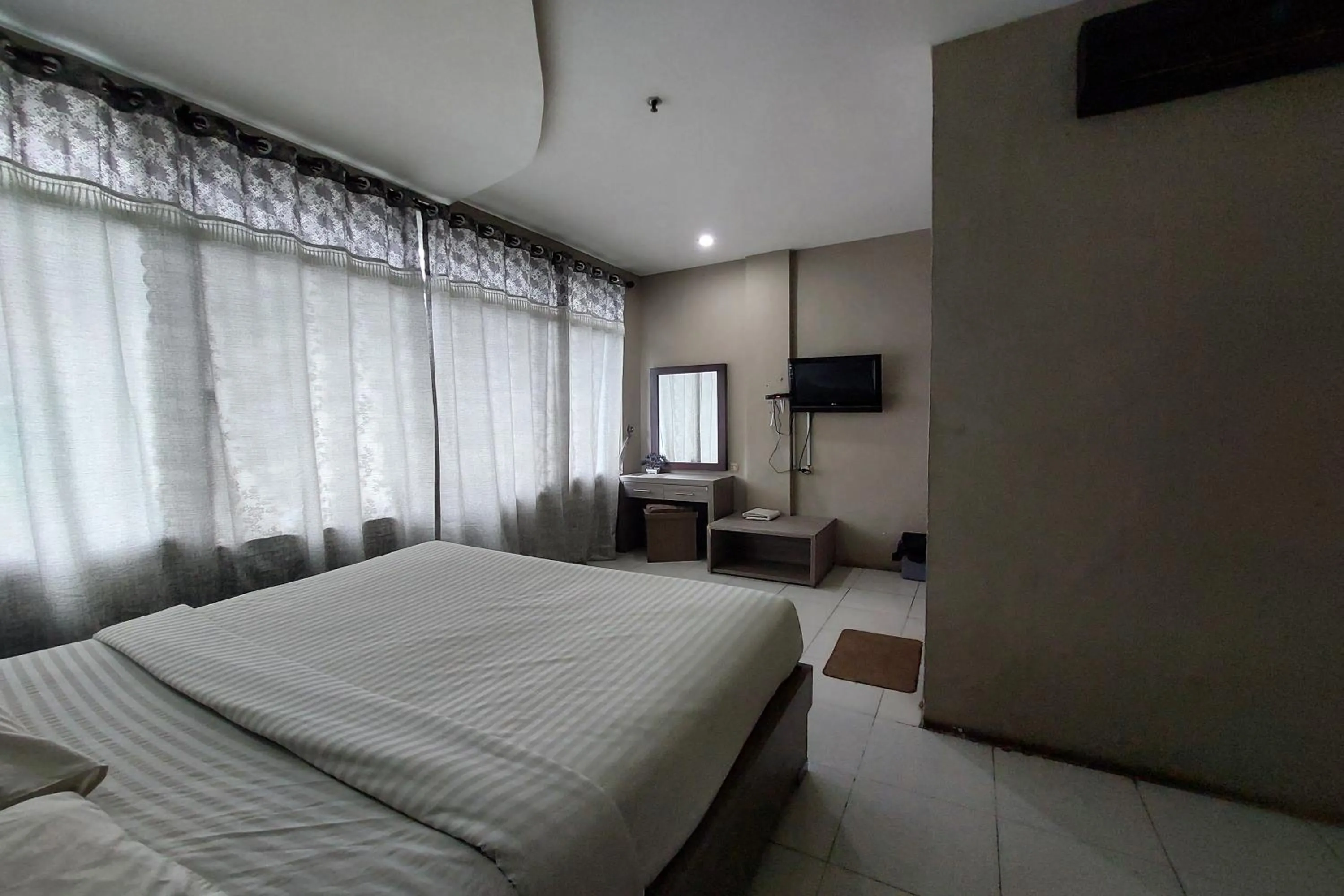 Bed in Hotel Bumi Malaya