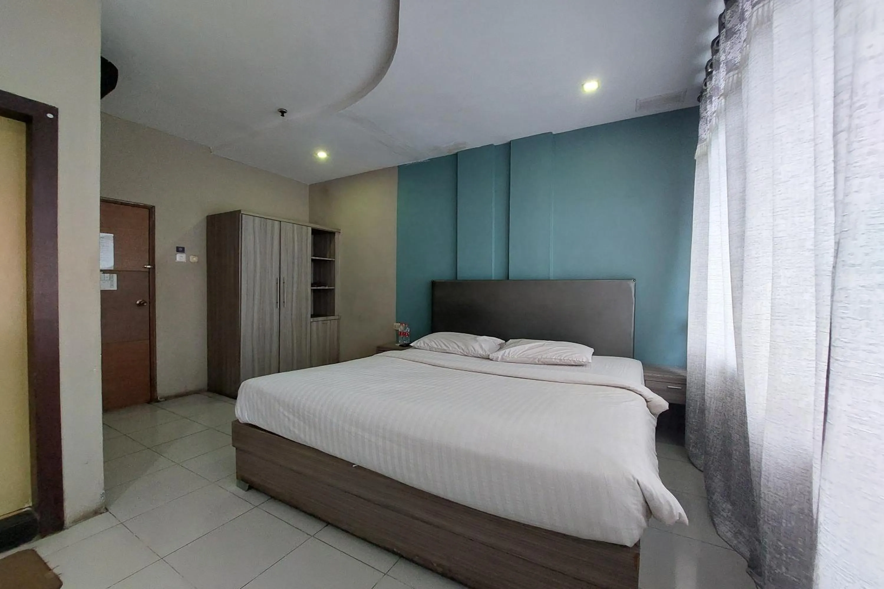 Bed in Hotel Bumi Malaya