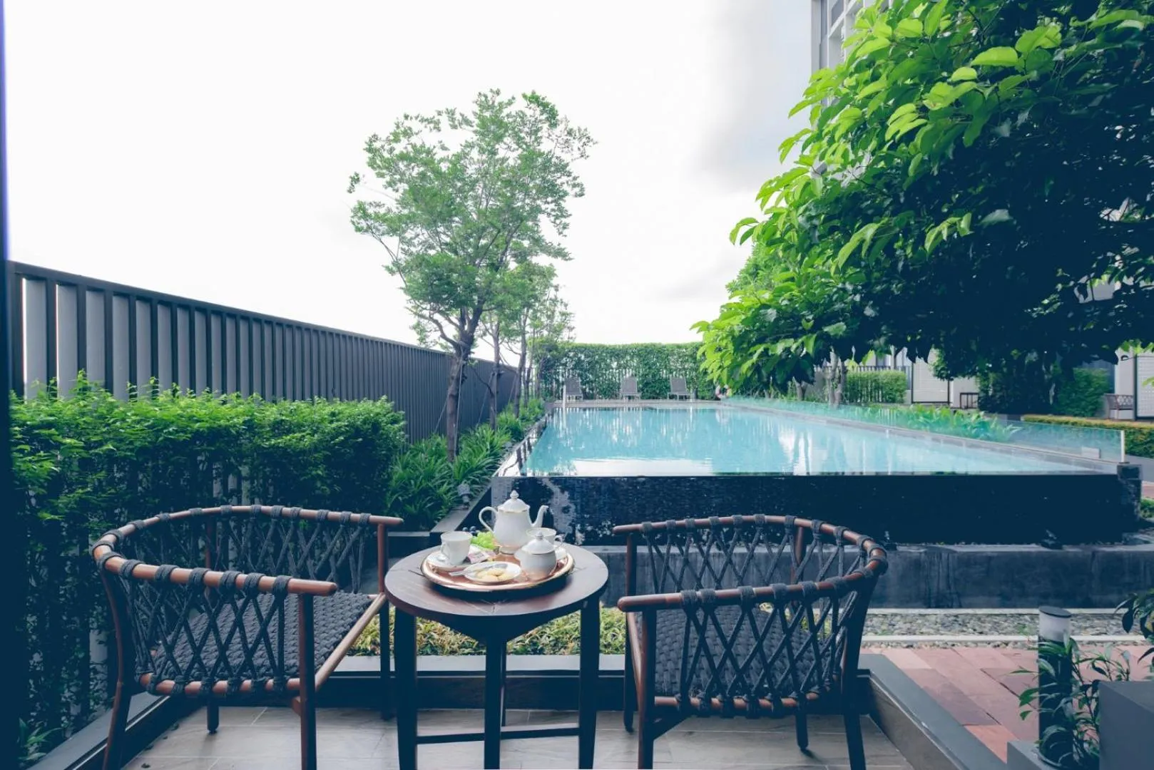 Swimming pool in Q-Box Hotel Bangkok Blossom (SHA Plus)