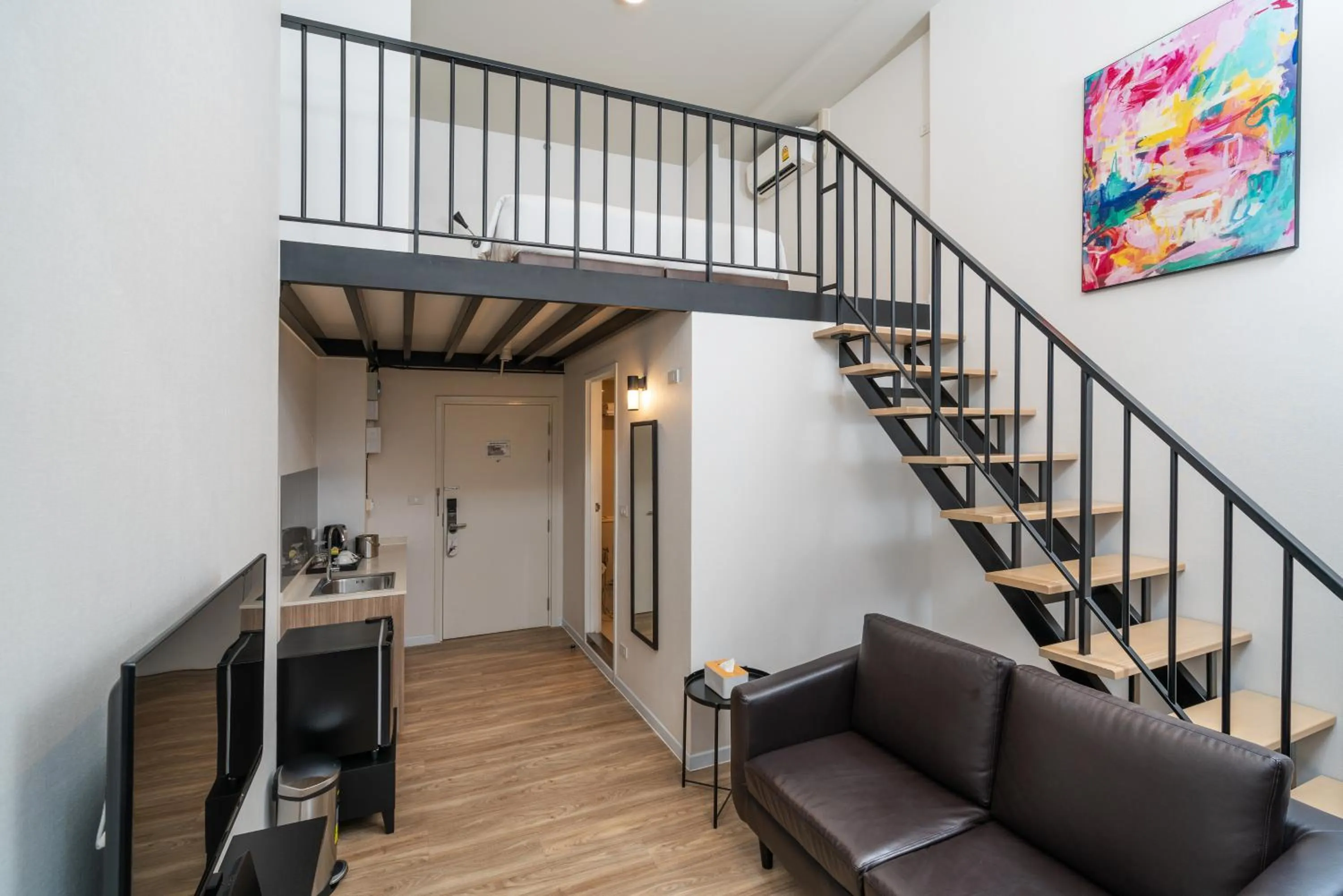 Seating Area in Q-Box Hotel Bangkok Blossom (SHA Plus)