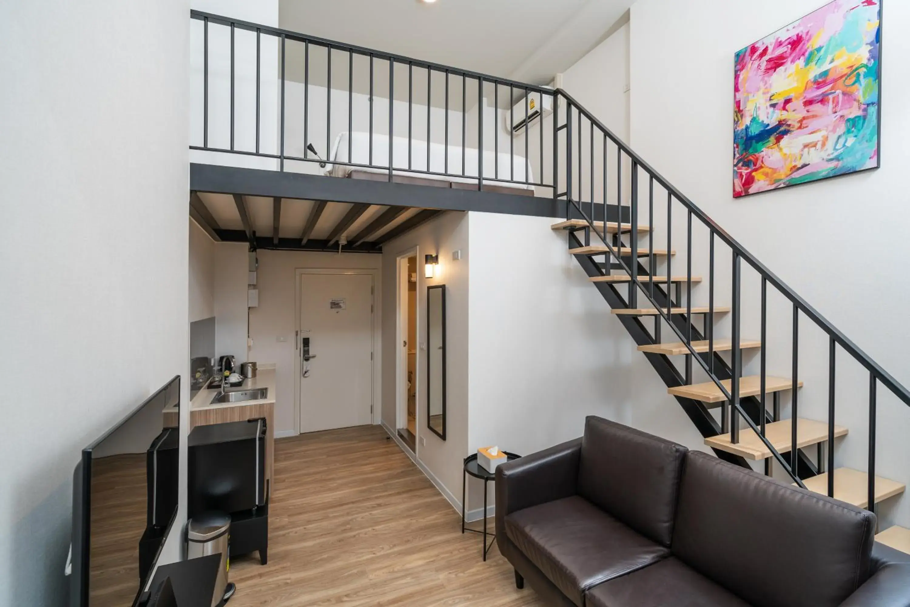 Living room in SureStay by Best Western Bangkok Ramintra Living room in SureStay by Best Western Bangkok Ramintra