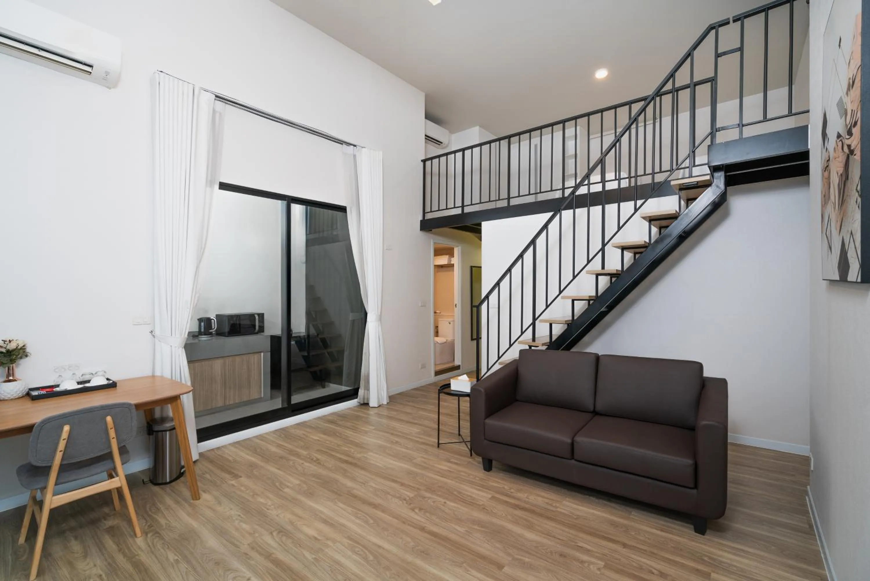 Seating Area in Q-Box Hotel Bangkok Blossom (SHA Plus)