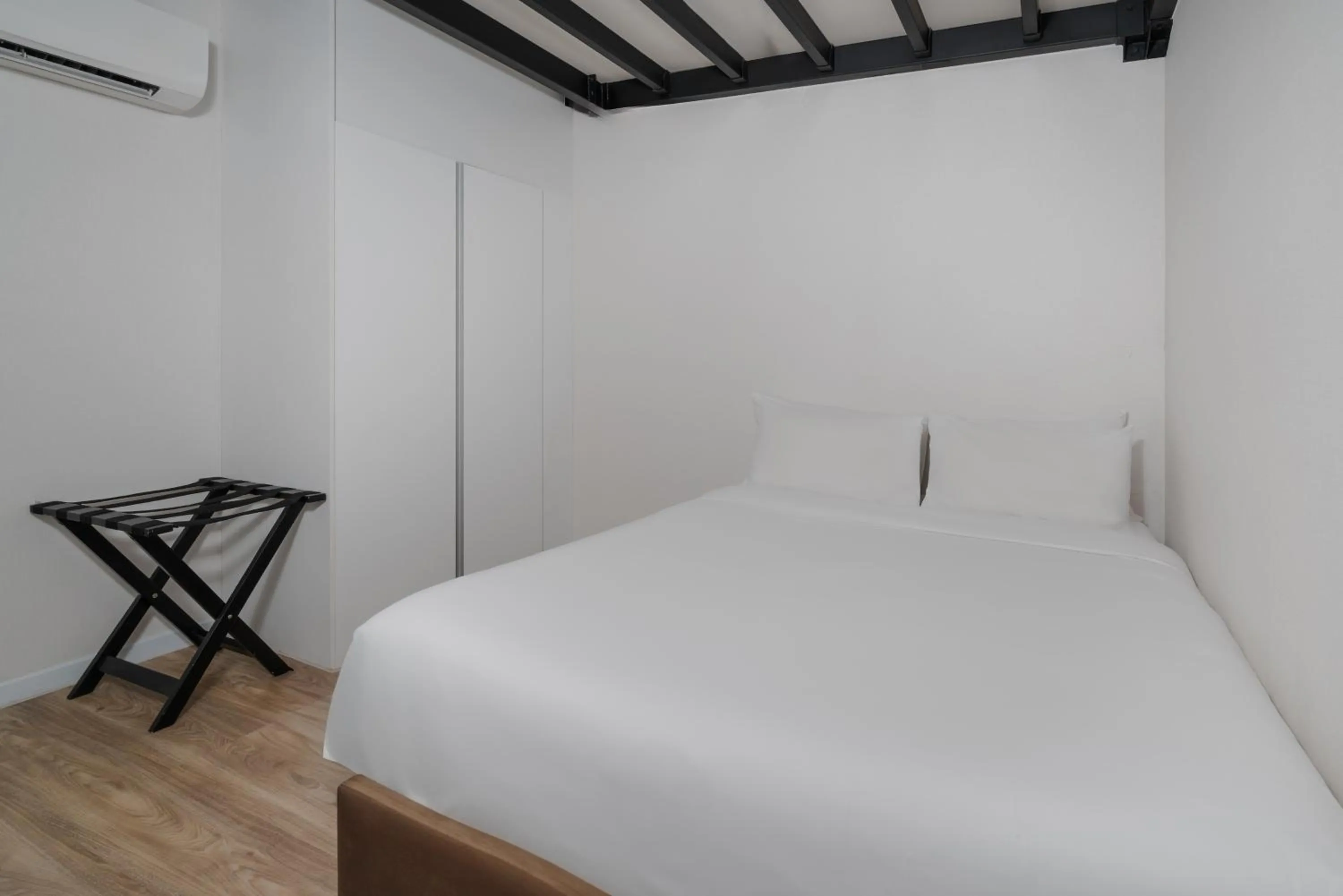 Bed in Q-Box Hotel Bangkok Blossom (SHA Plus)