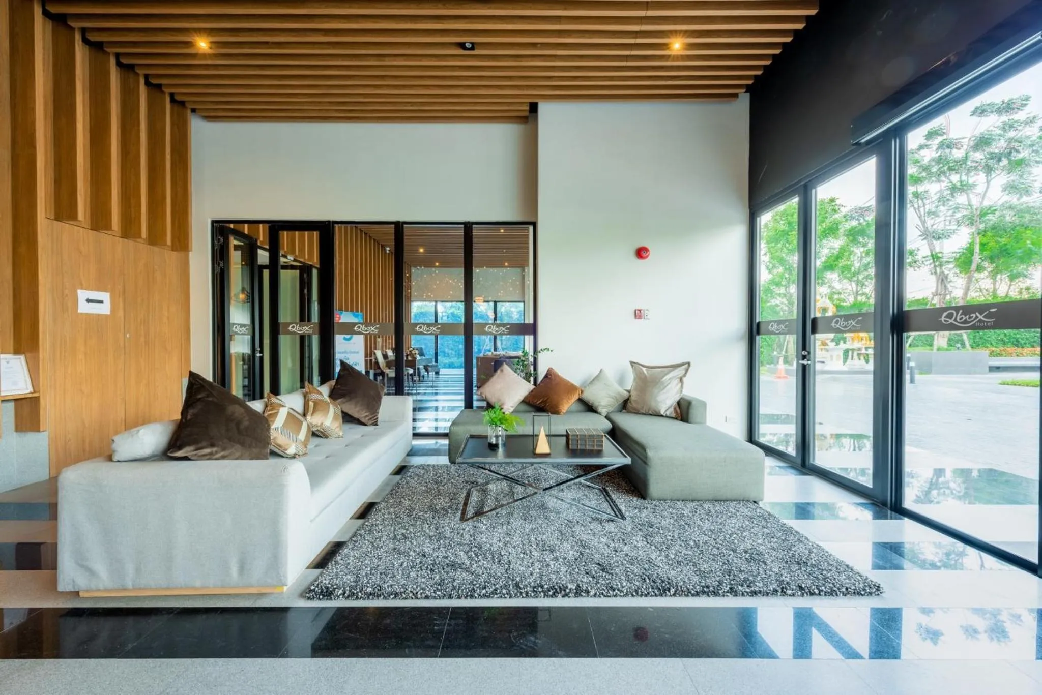 Seating Area in Q-Box Hotel Bangkok Blossom (SHA Plus)