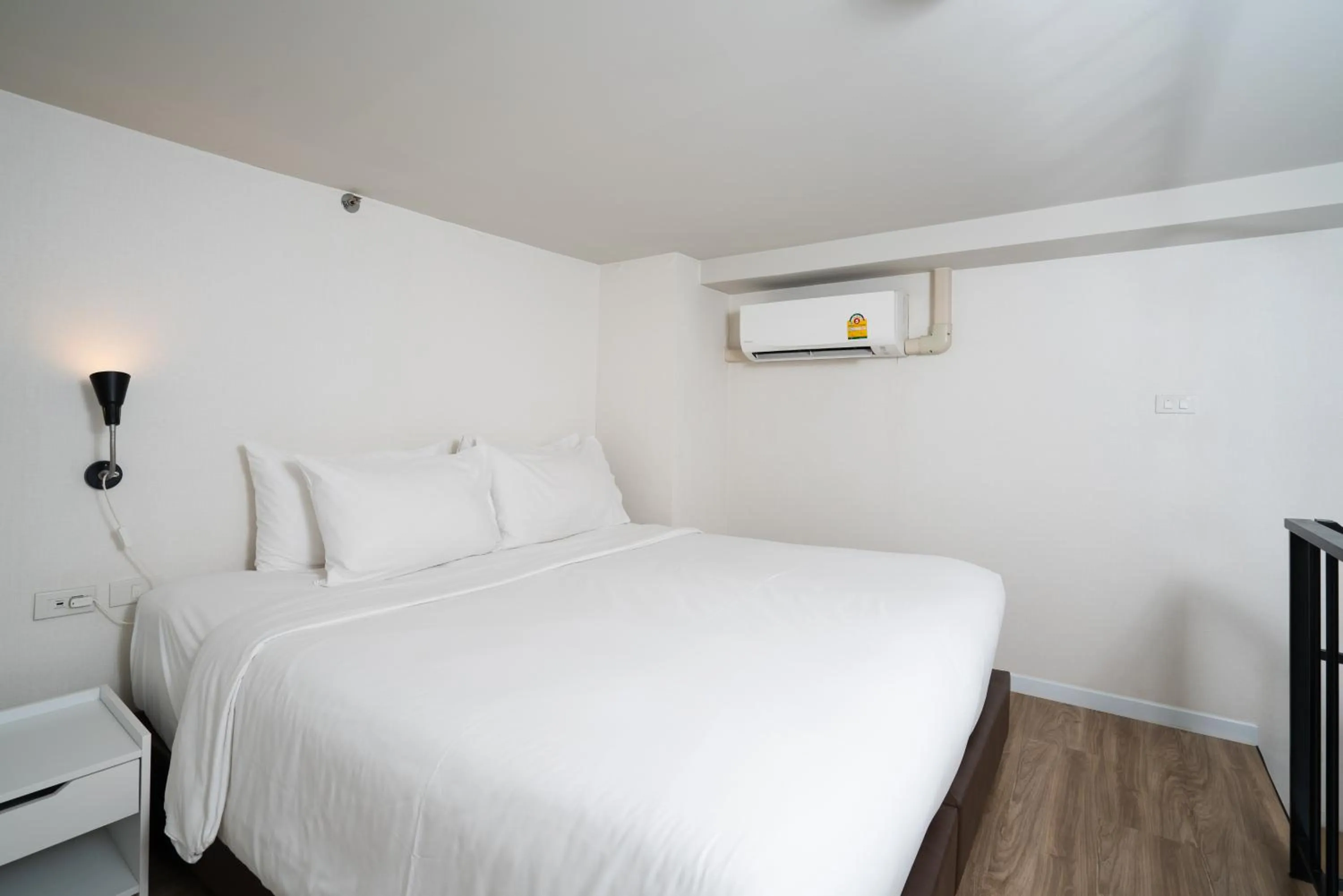 Bed in Q-Box Hotel Bangkok Blossom (SHA Plus)