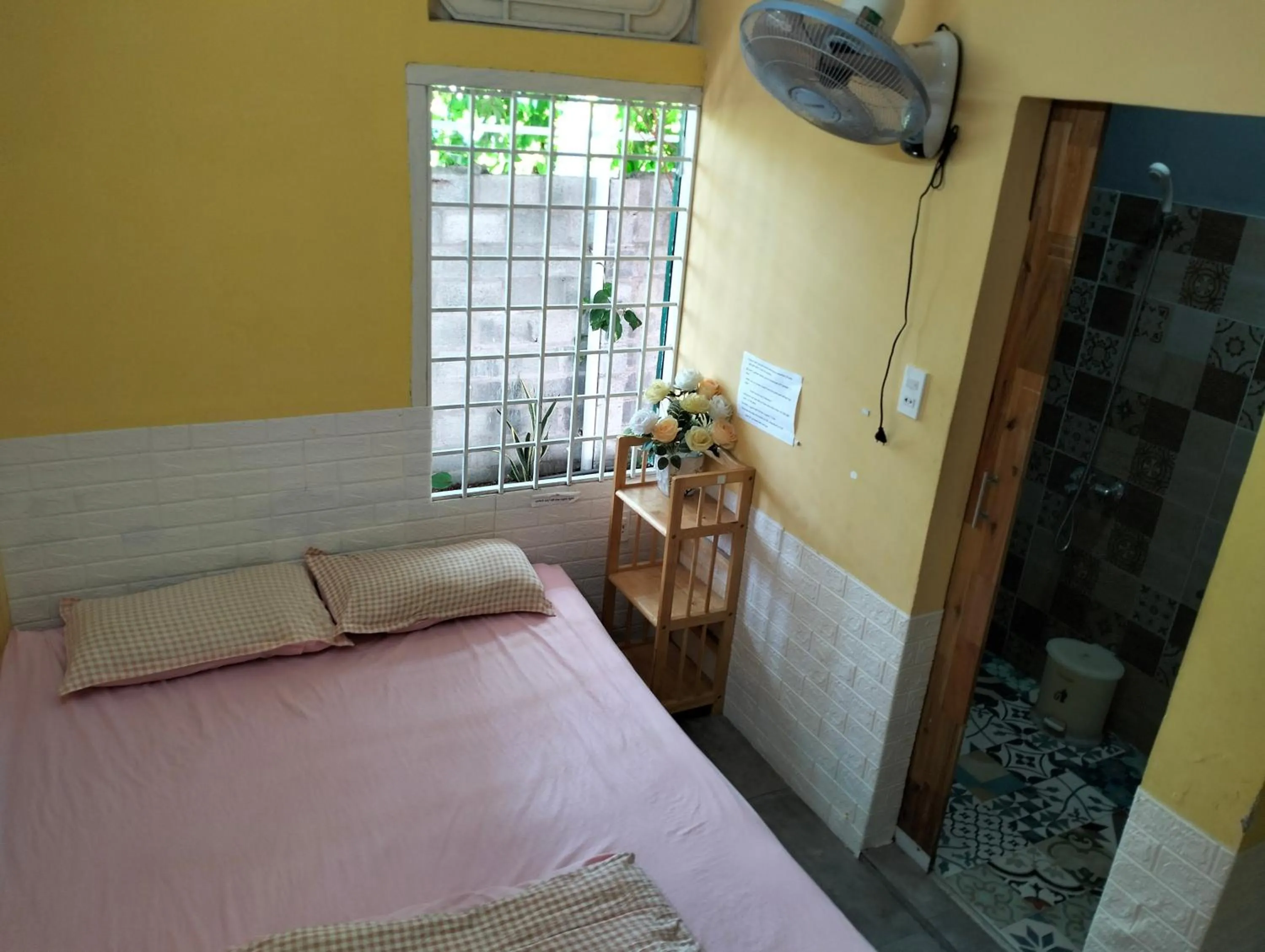 Photo of the whole room, Bed in BONNIE HOMESTAY Mui Ne