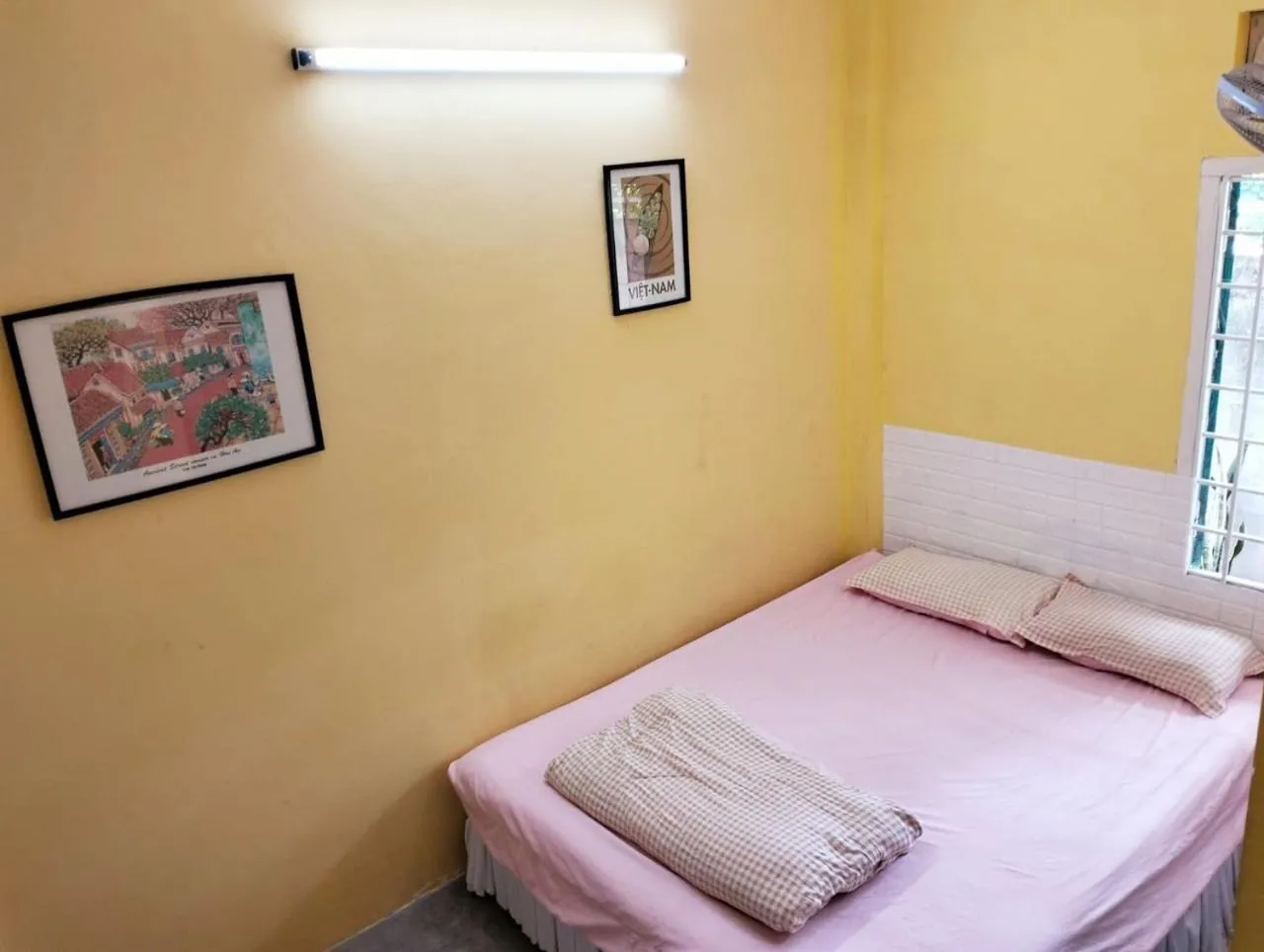 Bed in BONNIE HOMESTAY Mui Ne