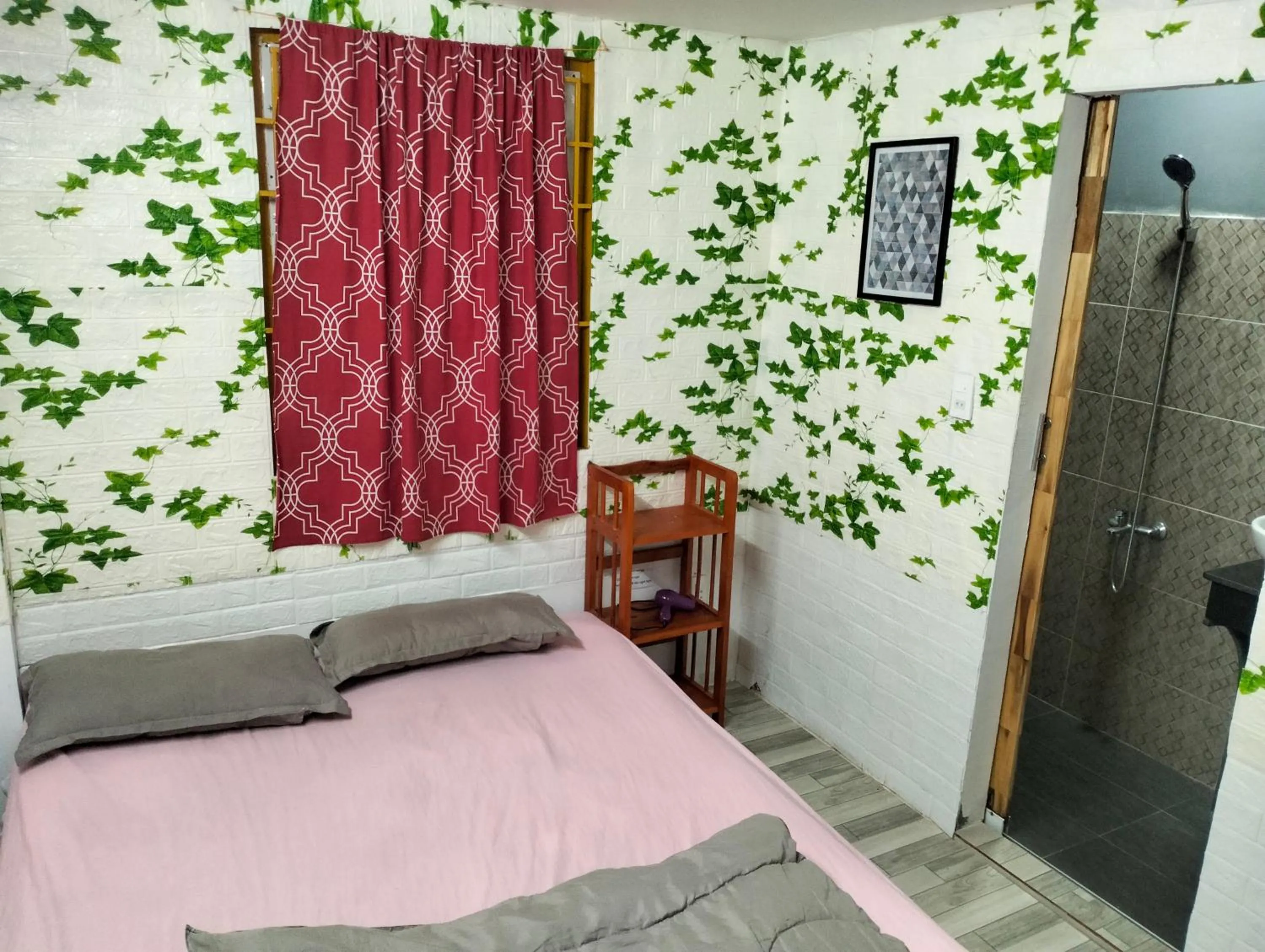 Bed in BONNIE HOMESTAY Mui Ne