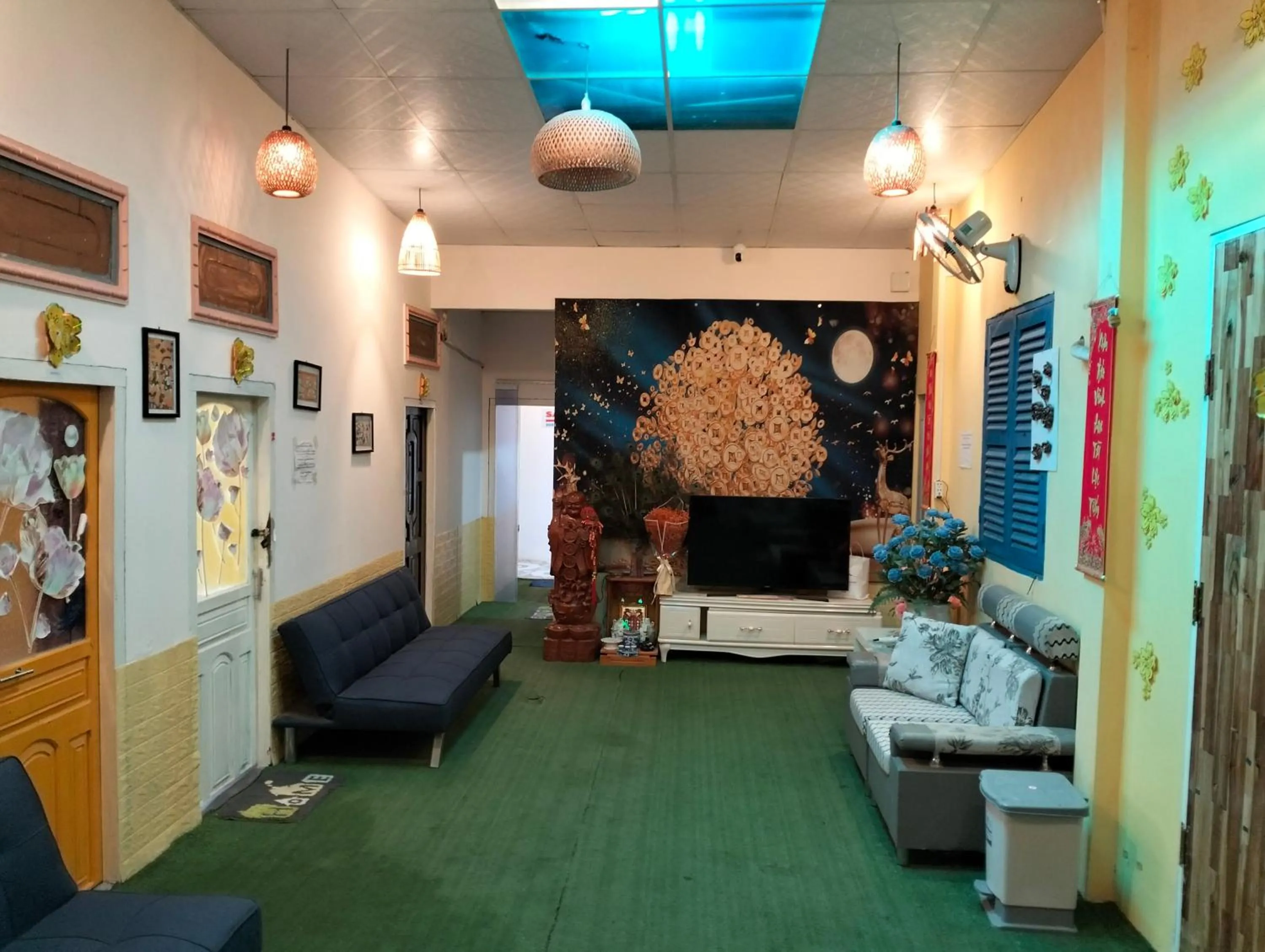 Communal lounge/ TV room in BONNIE HOMESTAY Mui Ne