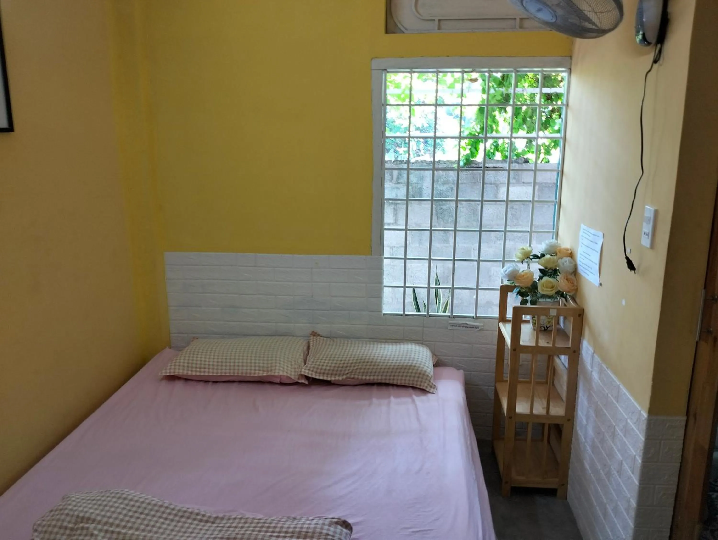 Bed in BONNIE HOMESTAY Mui Ne