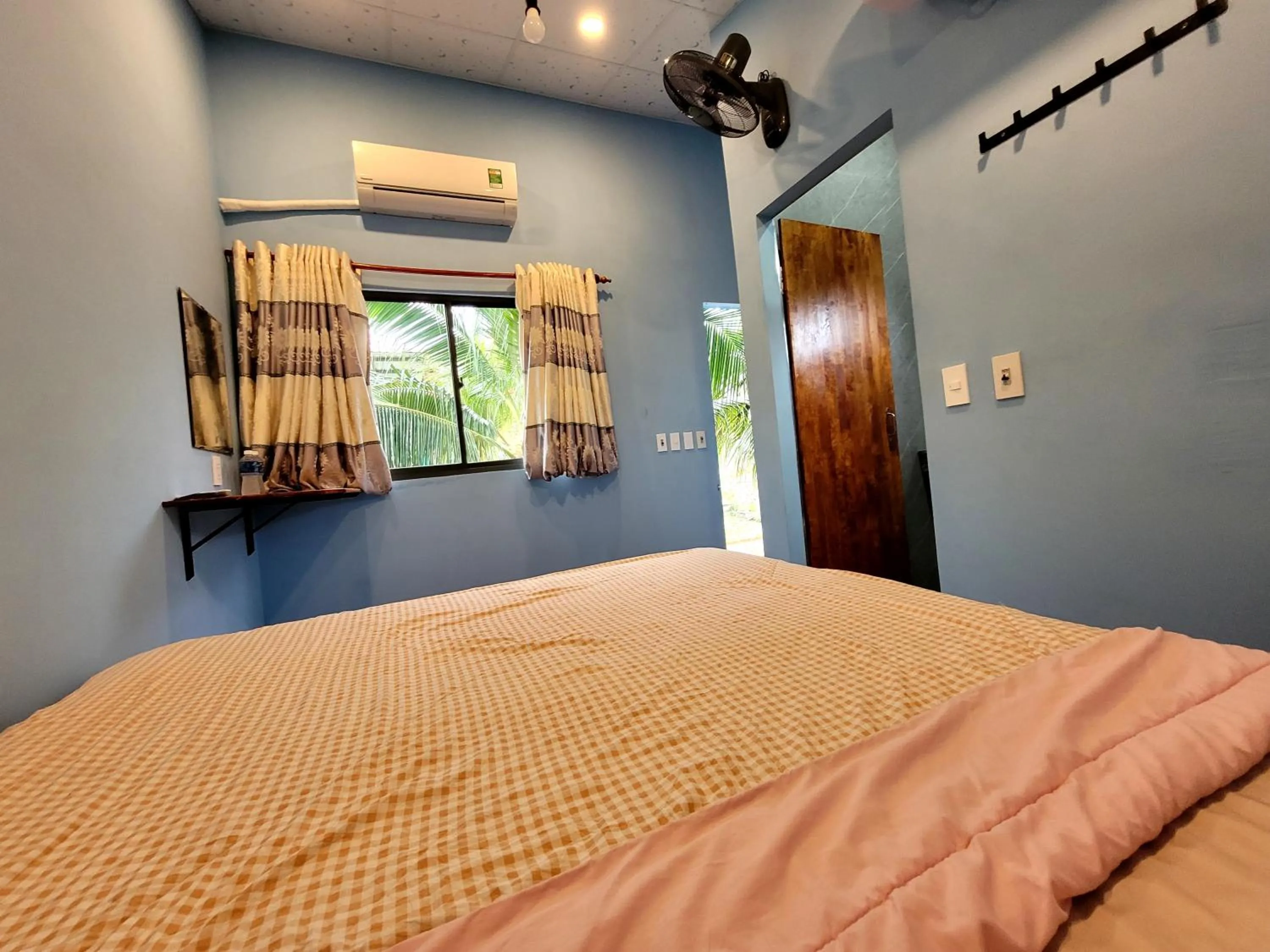 Bed in BONNIE HOMESTAY Mui Ne