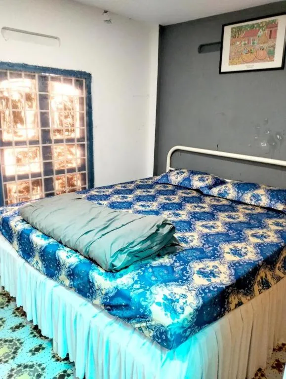 Bed in BONNIE HOMESTAY Mui Ne