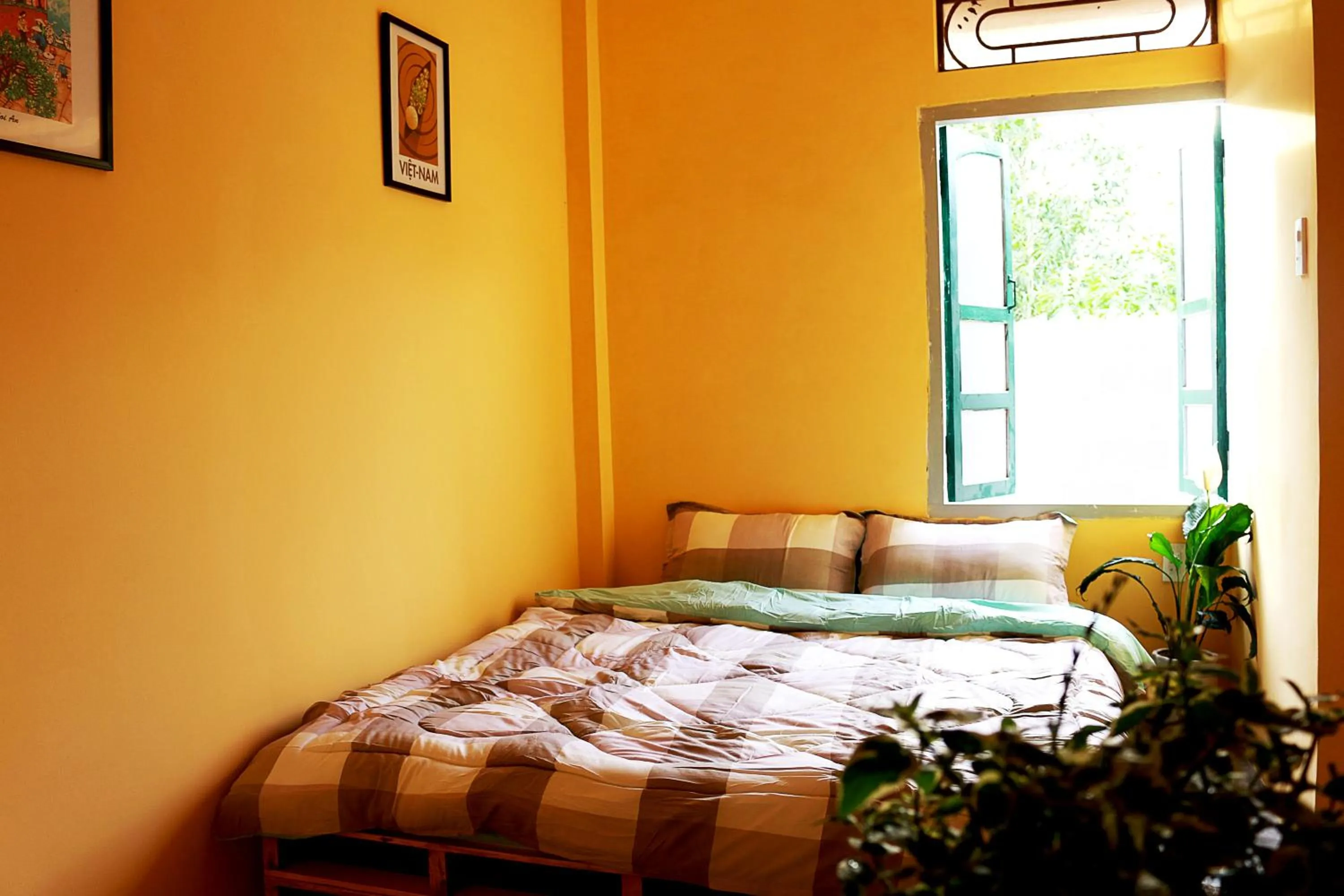 Bed in BONNIE HOMESTAY Mui Ne