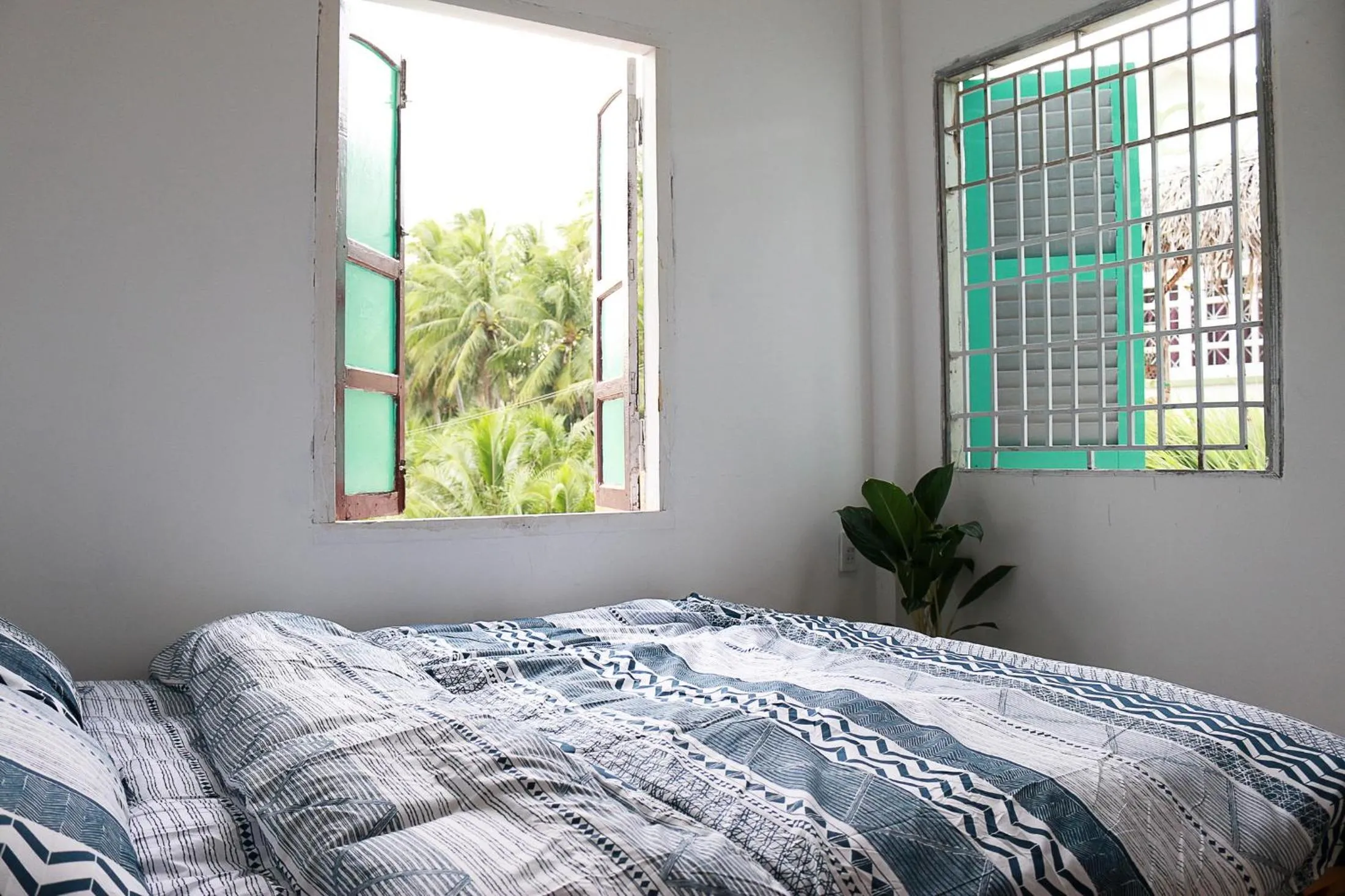 Bed in BONNIE HOMESTAY Mui Ne