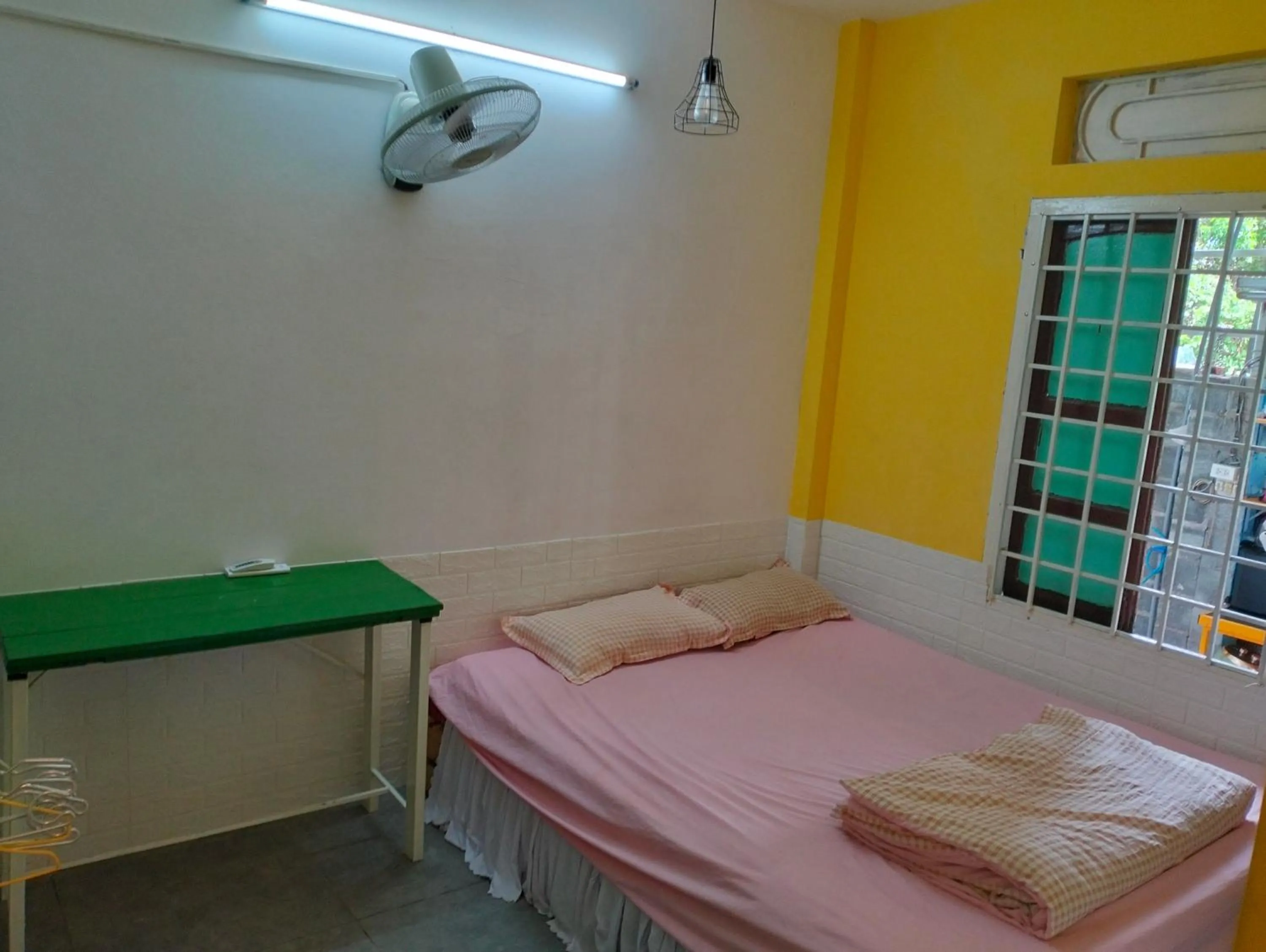 Bed in BONNIE HOMESTAY Mui Ne
