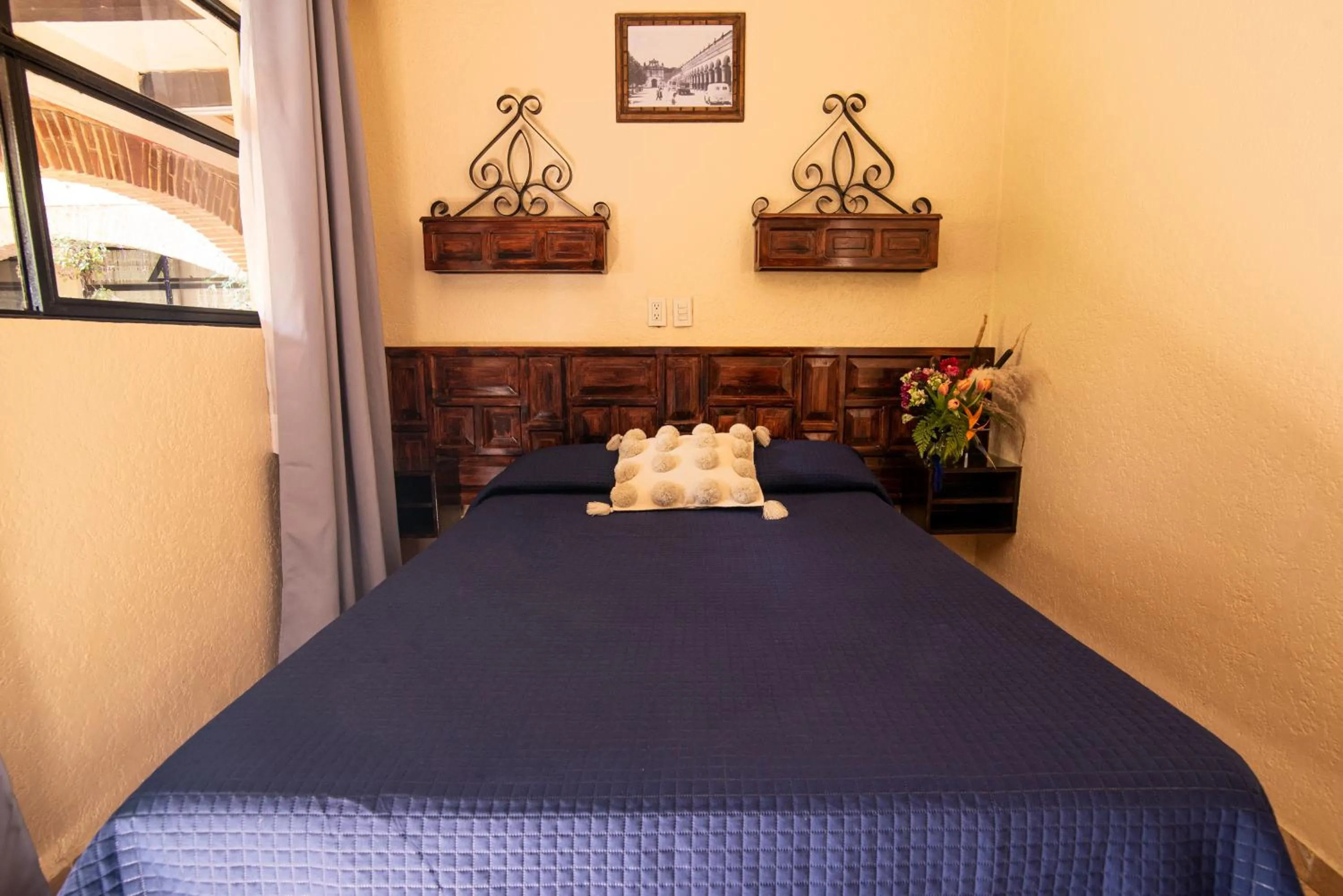 Bed in Hotel Palacio de Moctezuma