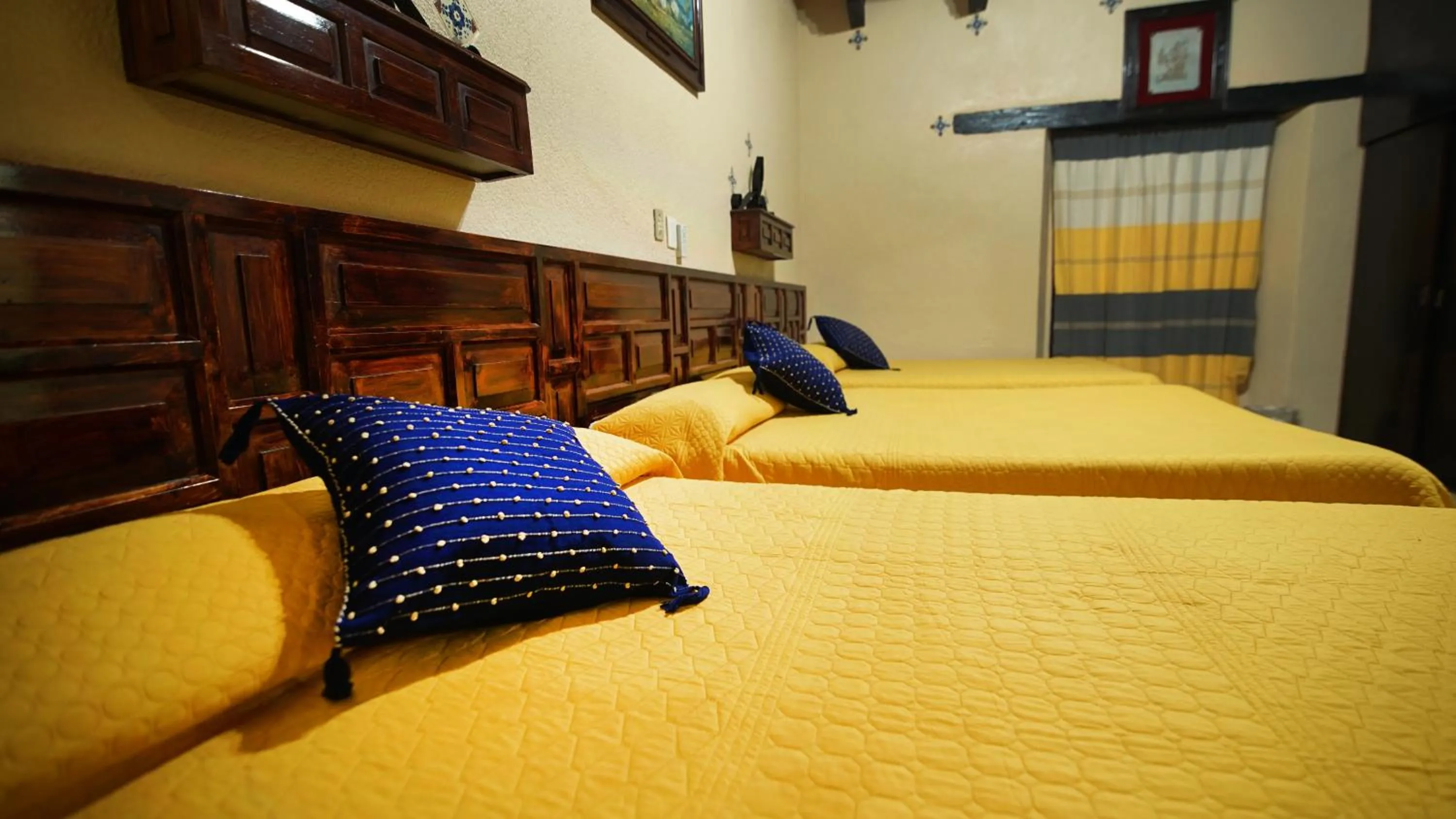 Bed in Hotel Palacio de Moctezuma